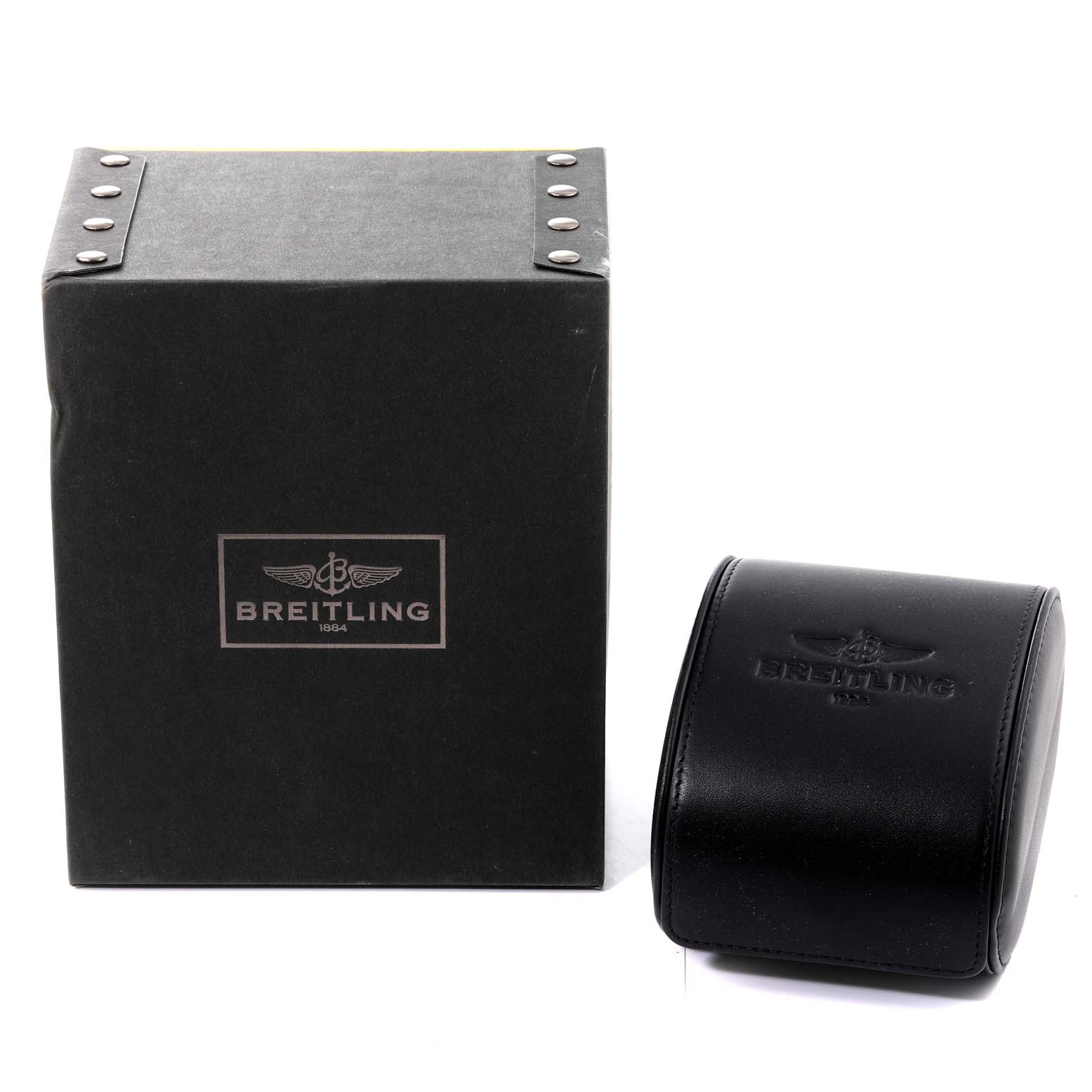 The image shows the packaging and storage case for a Colt model Breitling watch, viewed from the front.