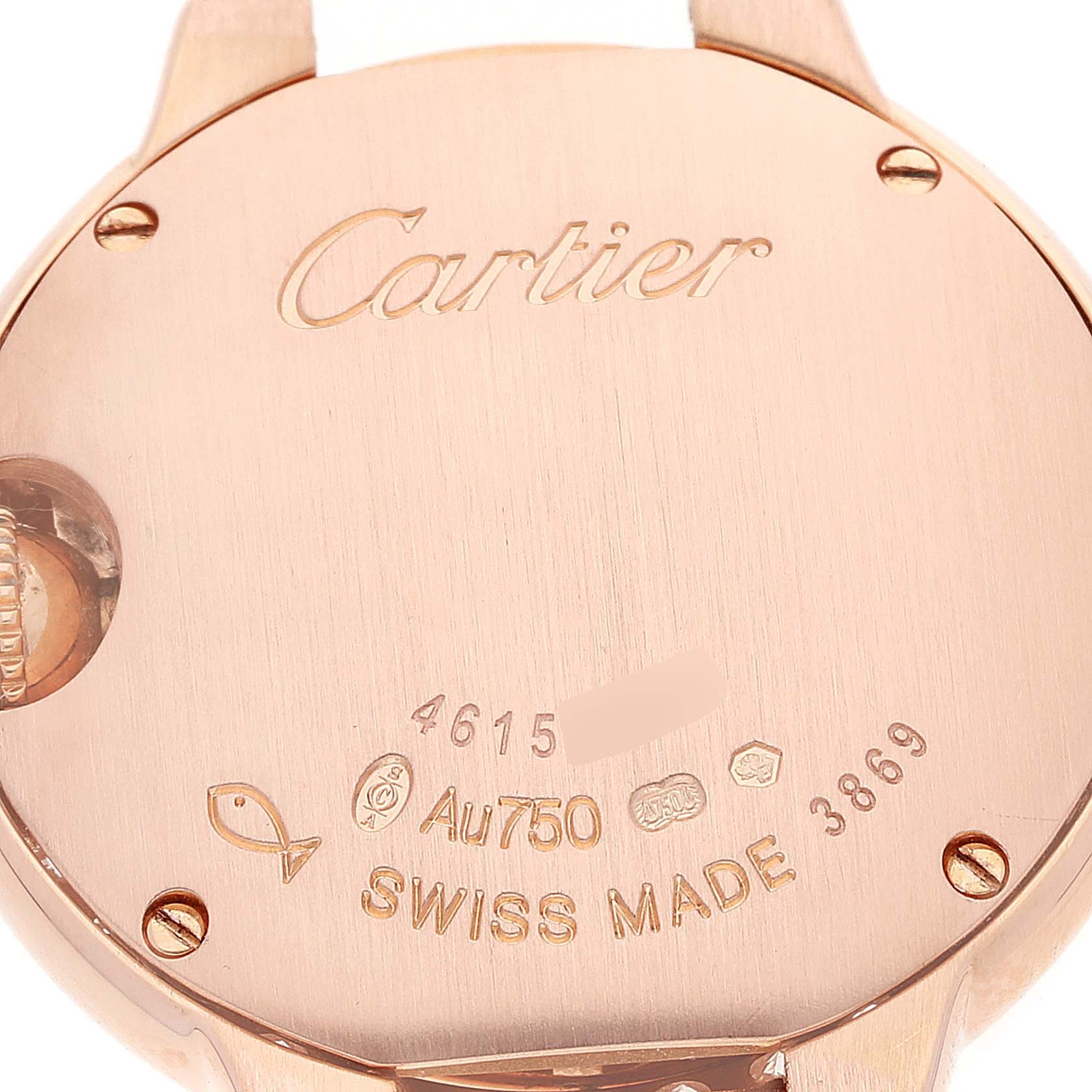 This image shows the back casing of a Cartier Ballon Bleu WE900251 Women
s Rose Gold Silver Dial WE900251 Women
s Rose Gold Silver Dial watch, highlighting the brand engraving, serial number, and Swiss Made markings.