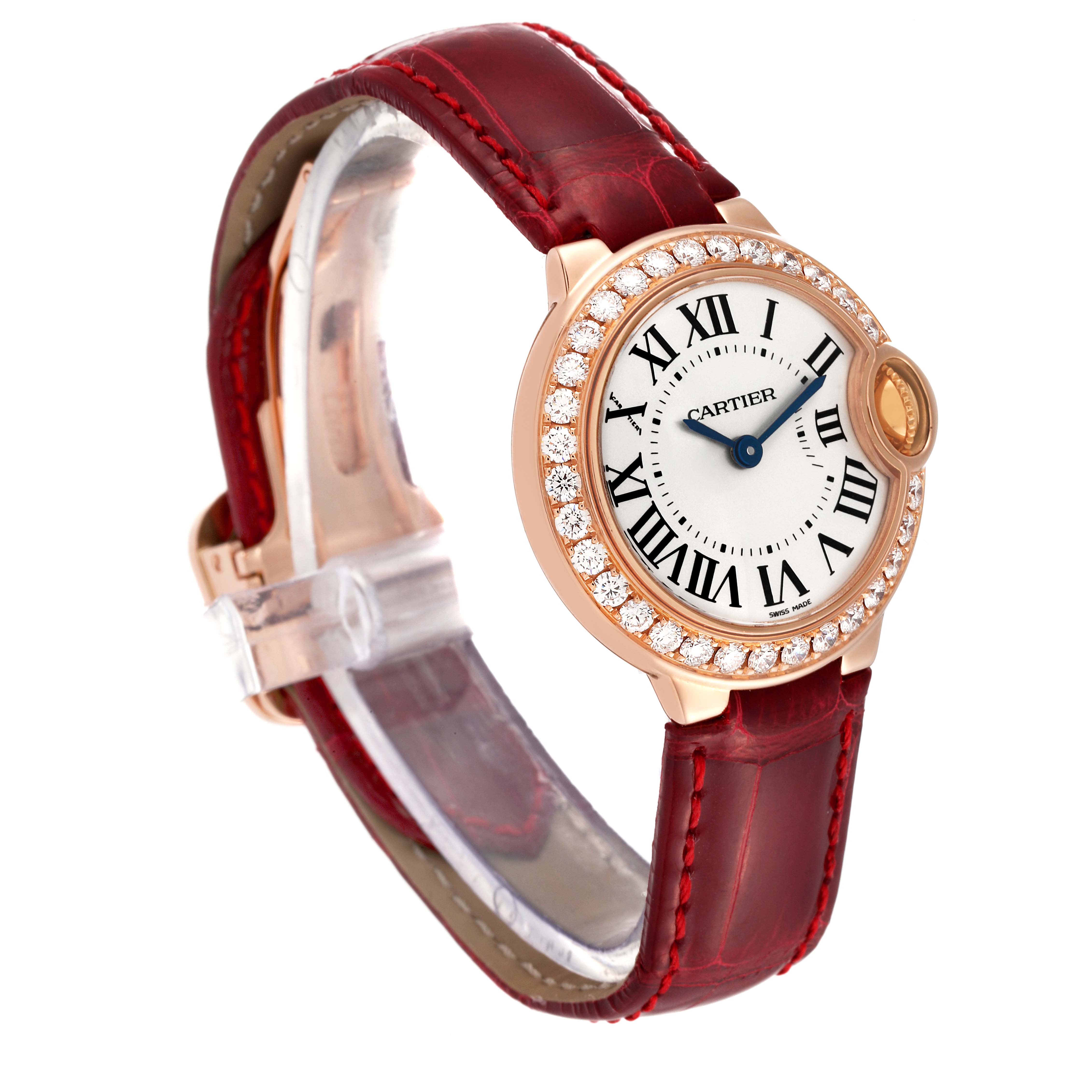 The image shows the Cartier Ballon Bleu WE900251 Women
s Rose Gold Silver Dial WE900251 Women
s Rose Gold Silver Dial watch from a side angle, displaying the face, bezel, and part of the strap.