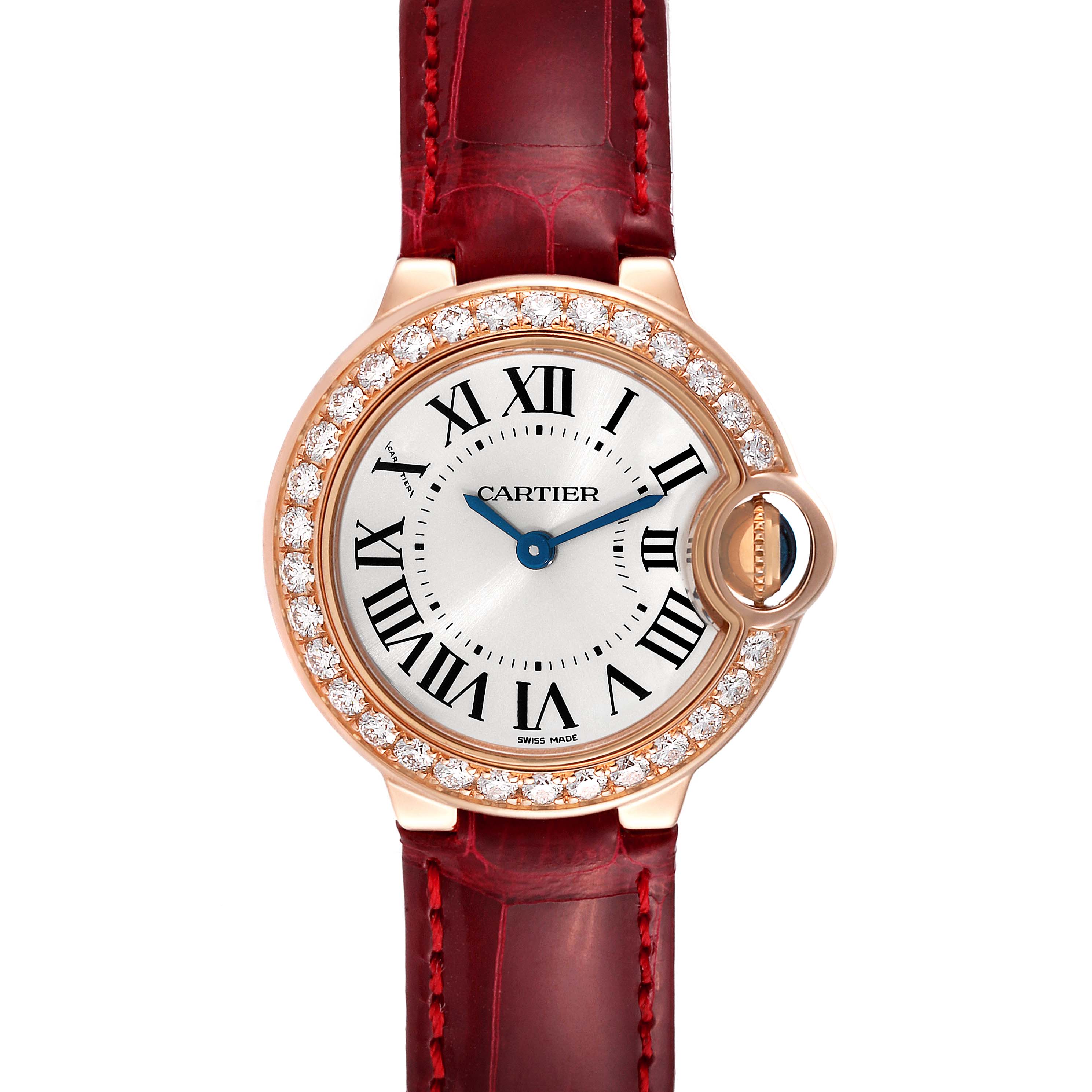 This image shows a front view of the Cartier Ballon Bleu WE900251 Women
s Rose Gold Silver Dial WE900251 Women
s Rose Gold Silver Dial watch with a diamond-studded bezel and a red leather strap.