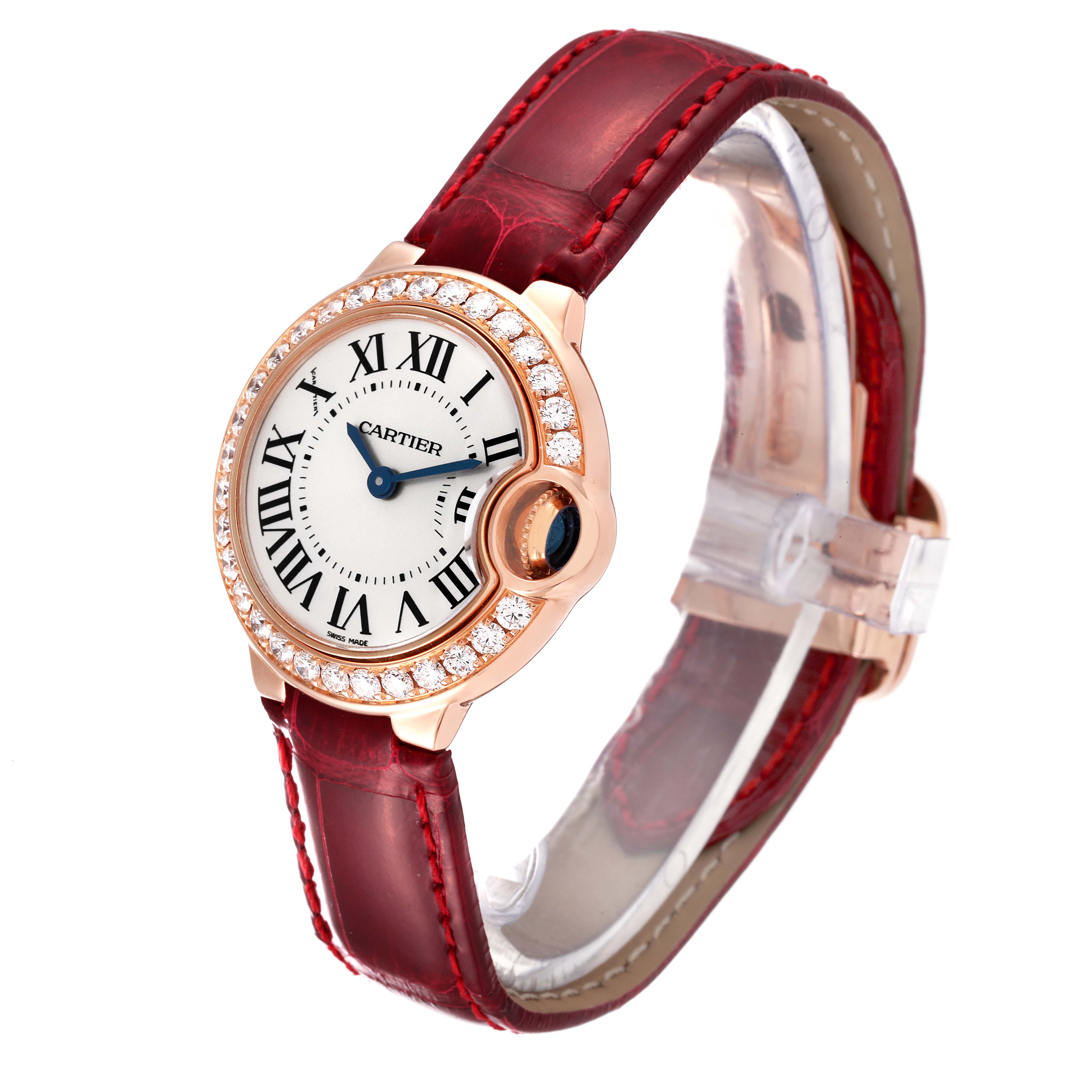 The Ballon Bleu by Cartier is shown from an angled front view, highlighting its round face, Roman numerals, diamond bezel, and leather strap.