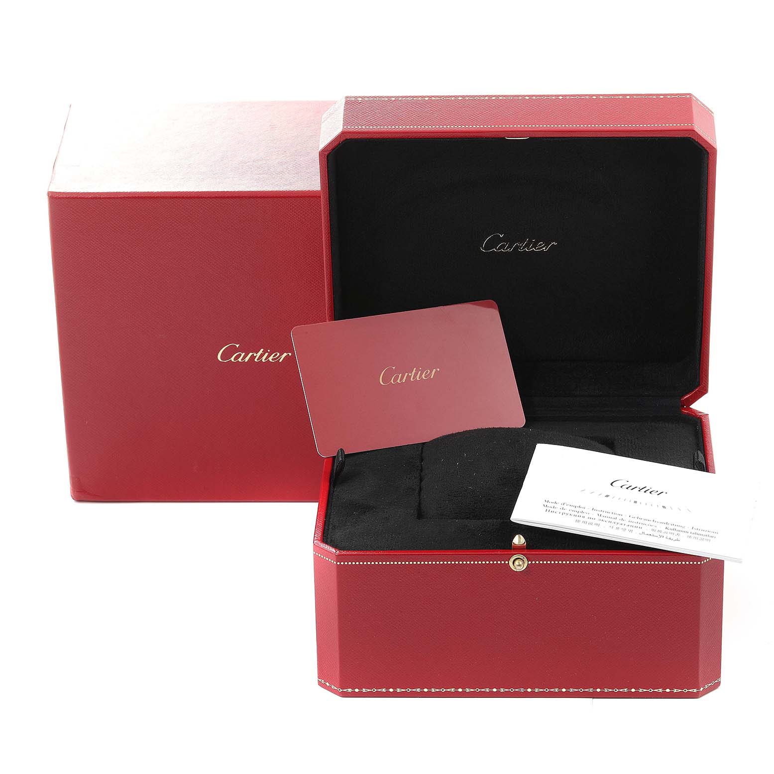 The image shows the red box for the Drive de Cartier watch by Cartier, including the interior compartment and accompanying documents.