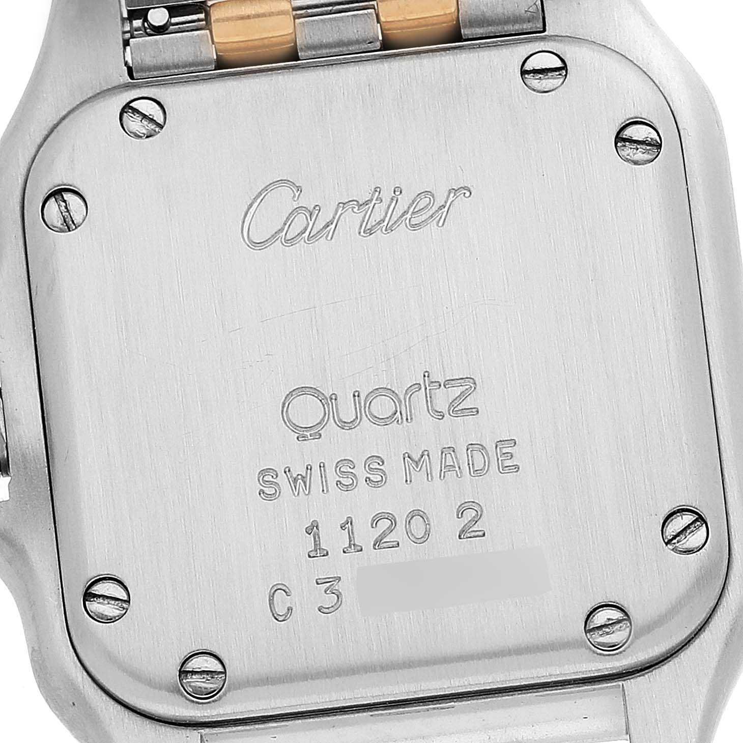 This image shows the back case of a Cartier Panthere W25029B6 Women's Steel and Gold (two tone) Silver Dial W25029B6 Women's Steel and Gold (two tone) Silver Dial watch, revealing the engravings and screws.