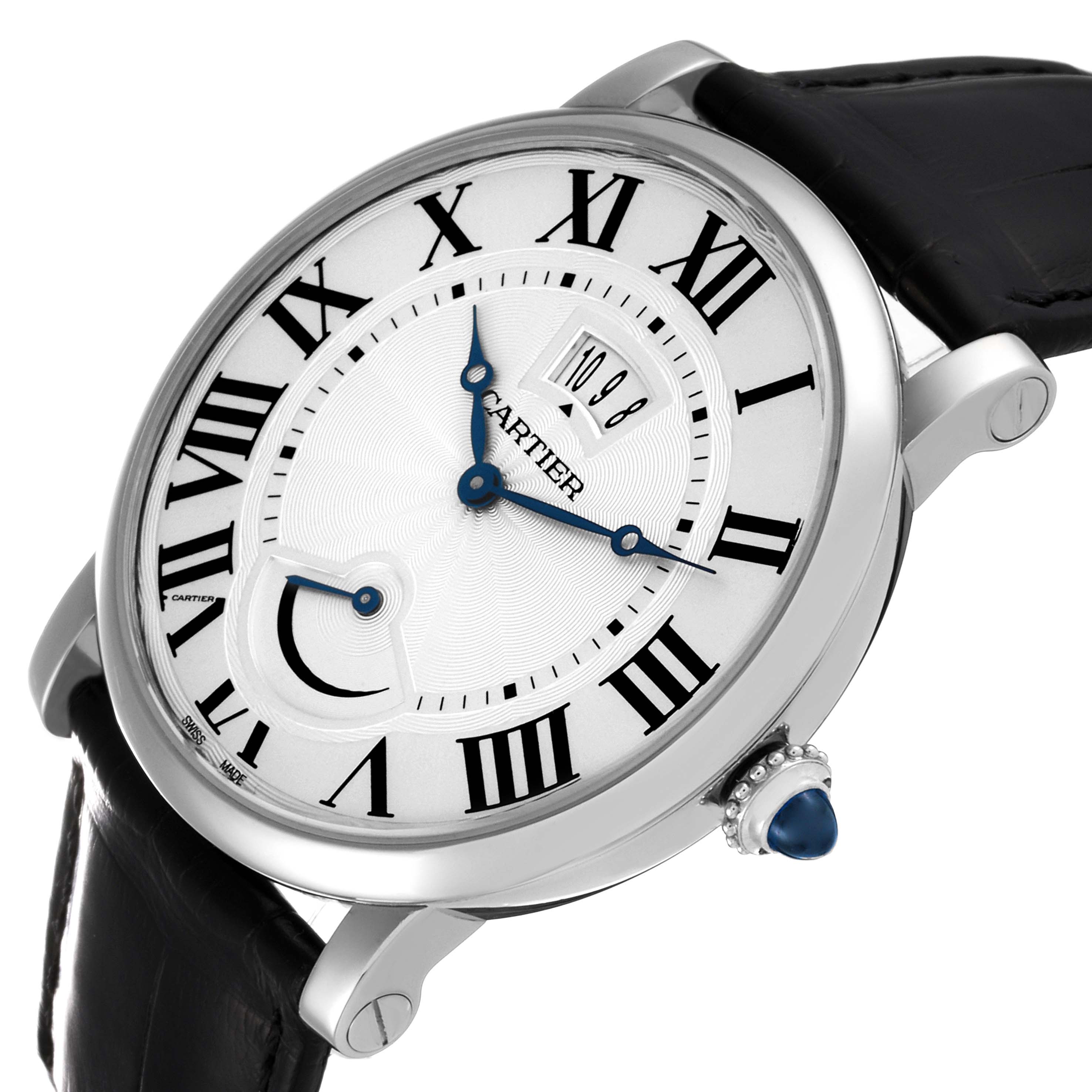 The image shows a Rotonde model watch by Cartier, angled diagonally, highlighting its dial, crown, and leather strap.