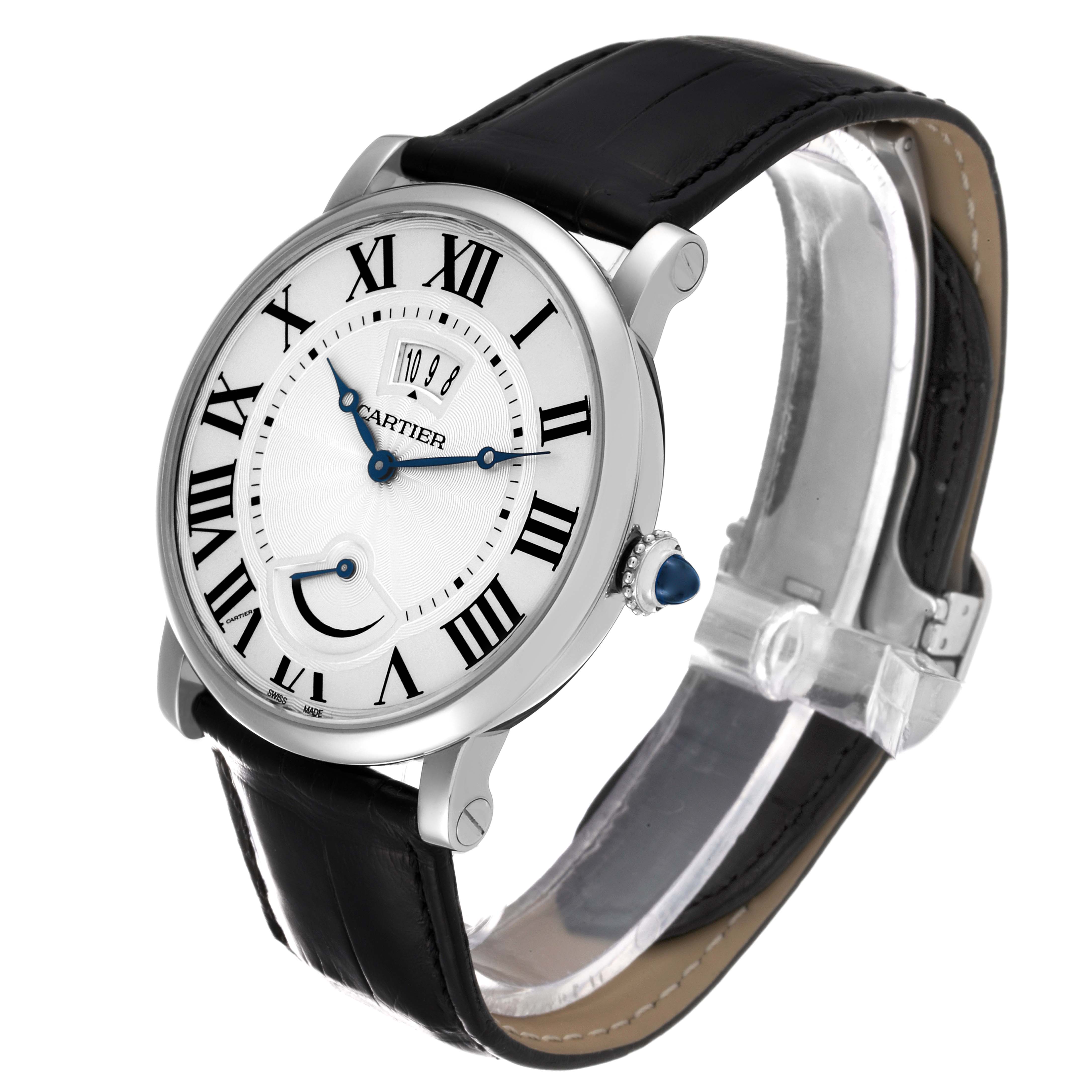 The image shows a Rotonde model by Cartier watch at a three-quarter angle, highlighting its face, strap, and crown.