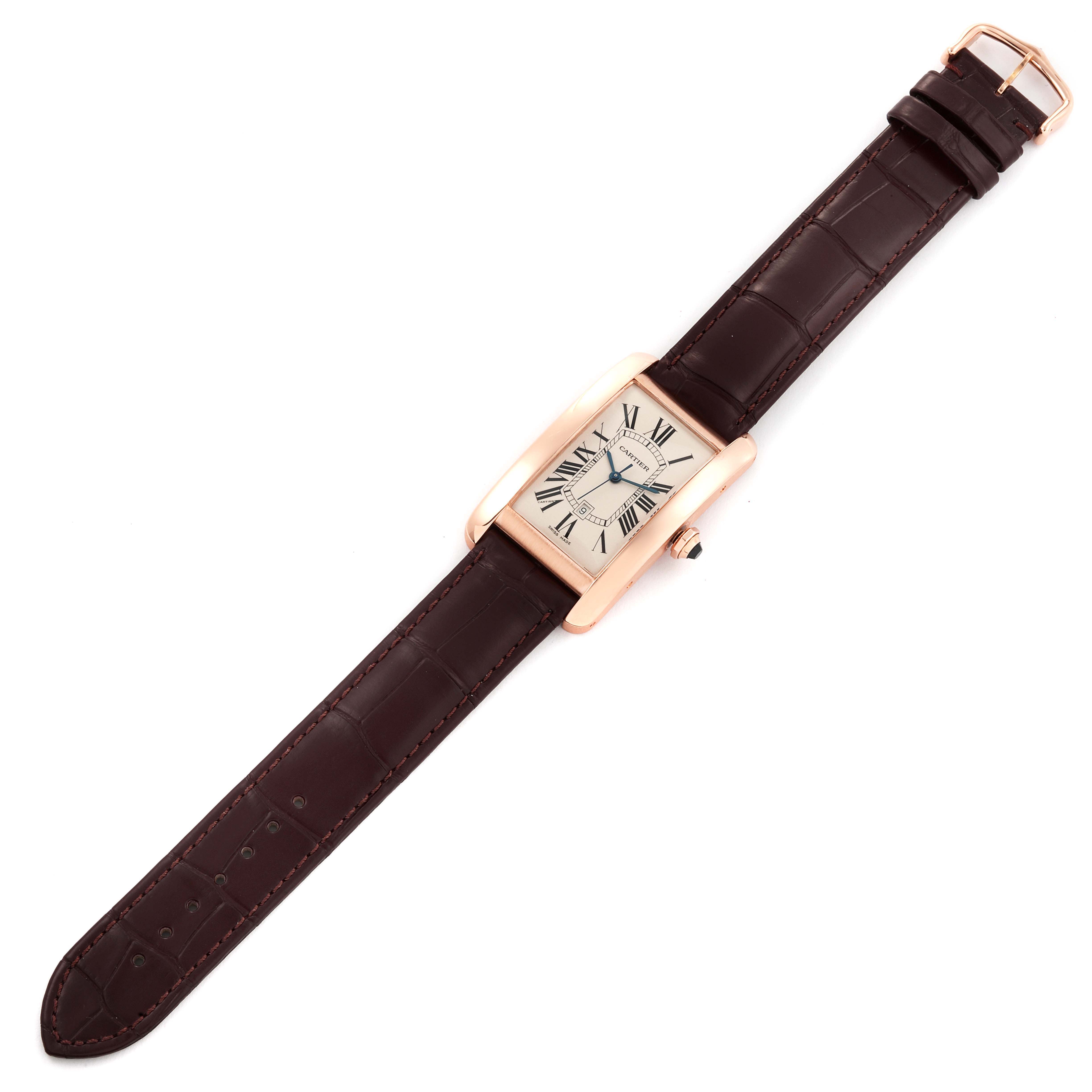 The image shows a Cartier Tank Américaine watch with a rectangular face and brown leather strap, displayed flat from a top view.
