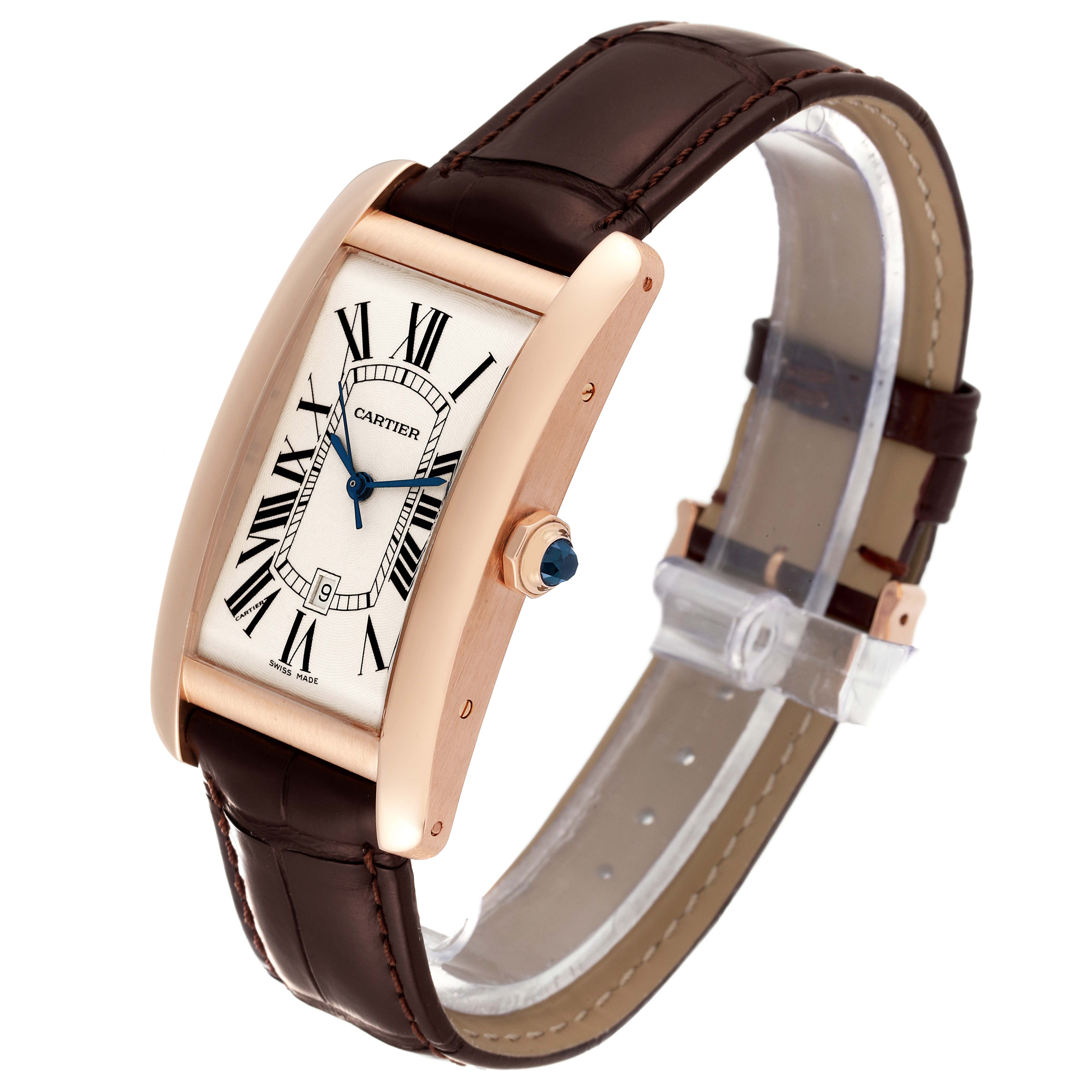 The image shows a Cartier Tank Américaine watch at a three-quarter angle, highlighting its face, crown, and brown leather strap.
