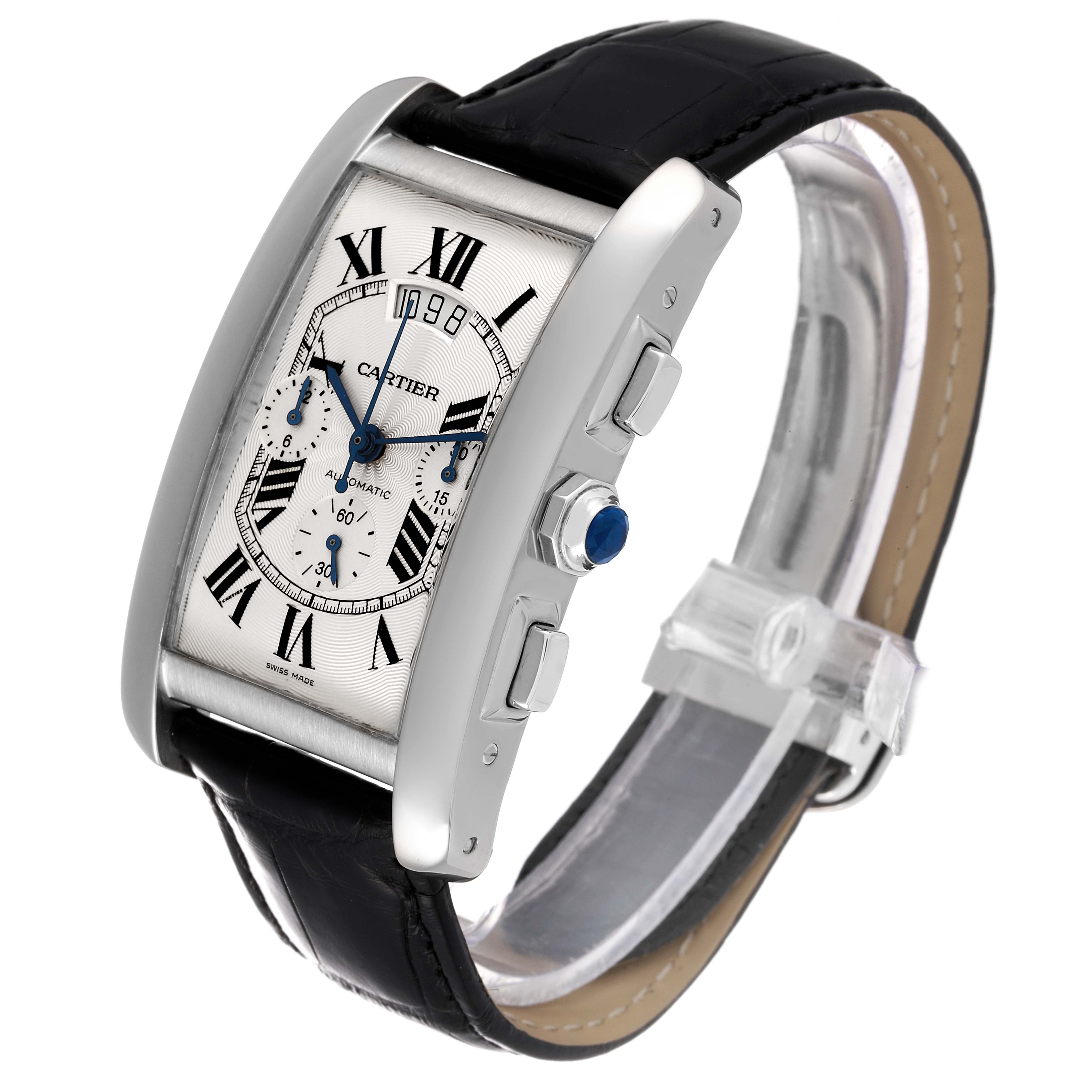The image shows a three-quarter view of the Cartier Tank Americaine W2609456 Men's White Gold Silver Dial W2609456 Men's White Gold Silver Dial watch, highlighting the face, side buttons, and strap.