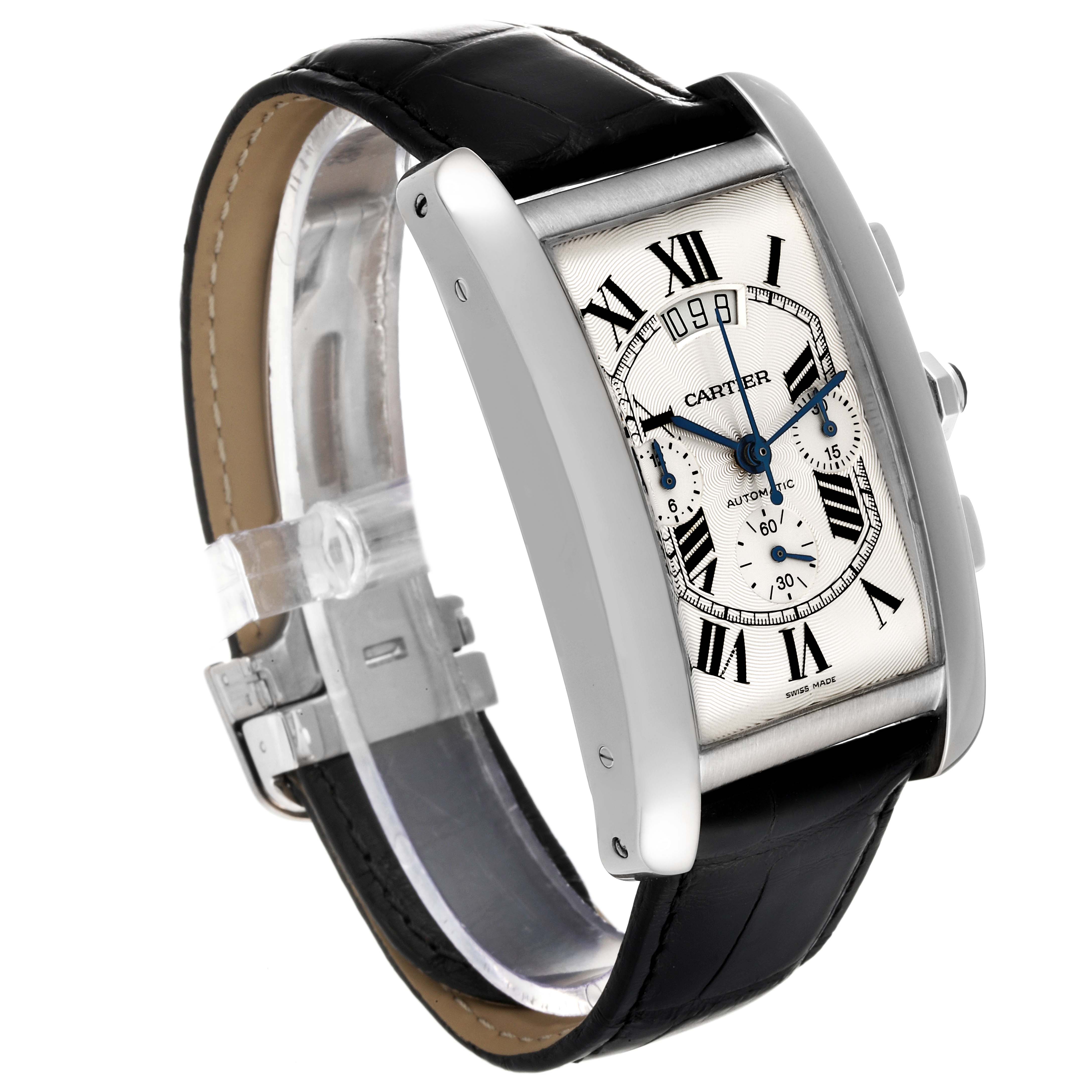 The image shows a Cartier Tank Americaine W2609456 Men's White Gold Silver Dial W2609456 Men's White Gold Silver Dial watch angled from the top left, displaying its face, side buttons, and leather strap.