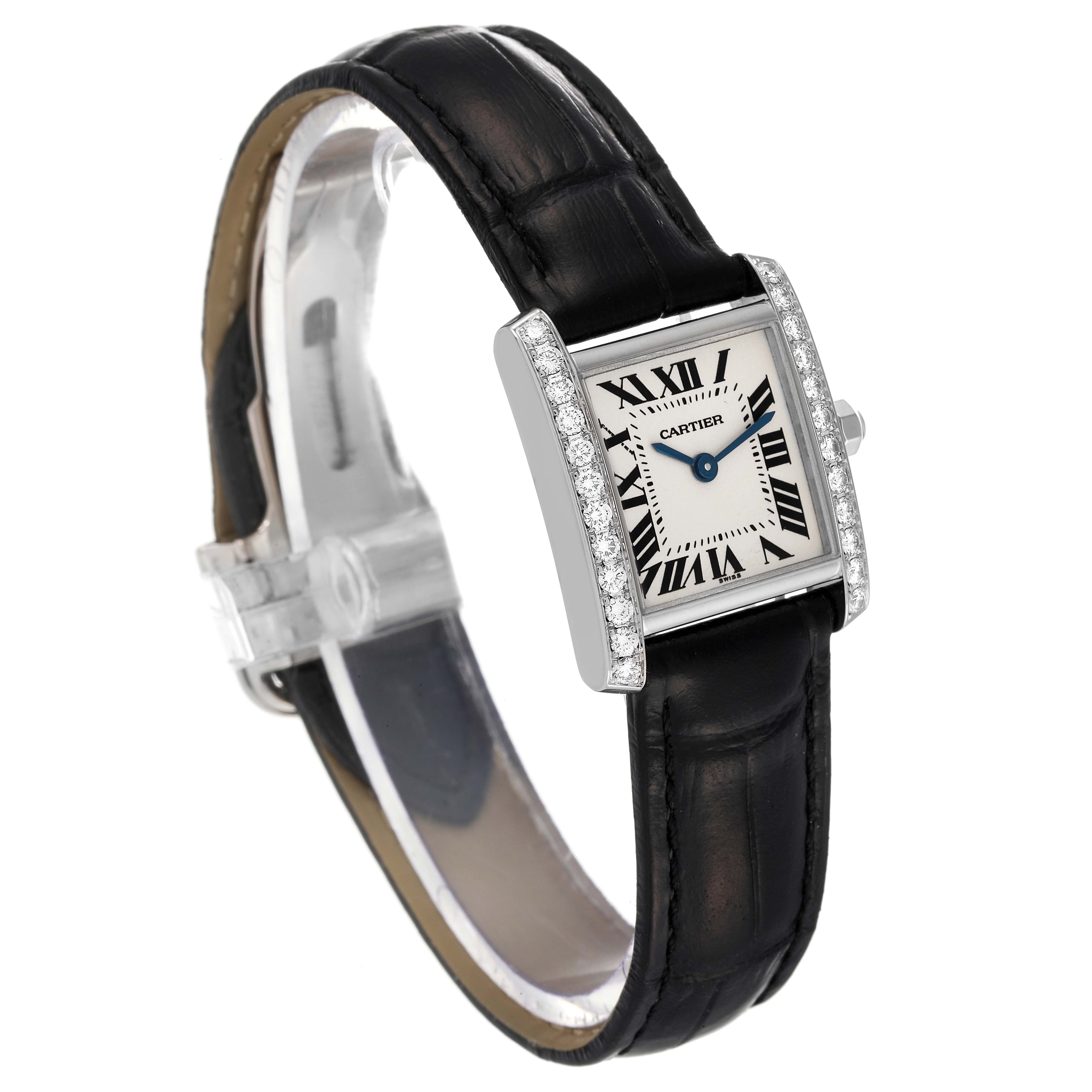 The image shows a Cartier Tank Francaise WE100251 Women's White Gold Silver Dial WE100251 Women's White Gold Silver Dial watch angled to display its face, bezel, and black leather strap.