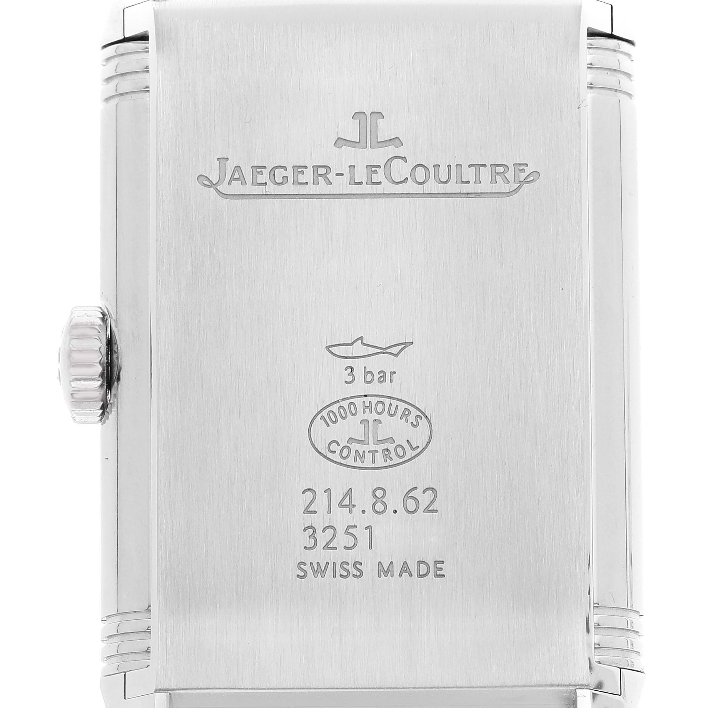 The image displays the back of the Jaeger-LeCoultre Reverso watch, showing engravings and the crown.