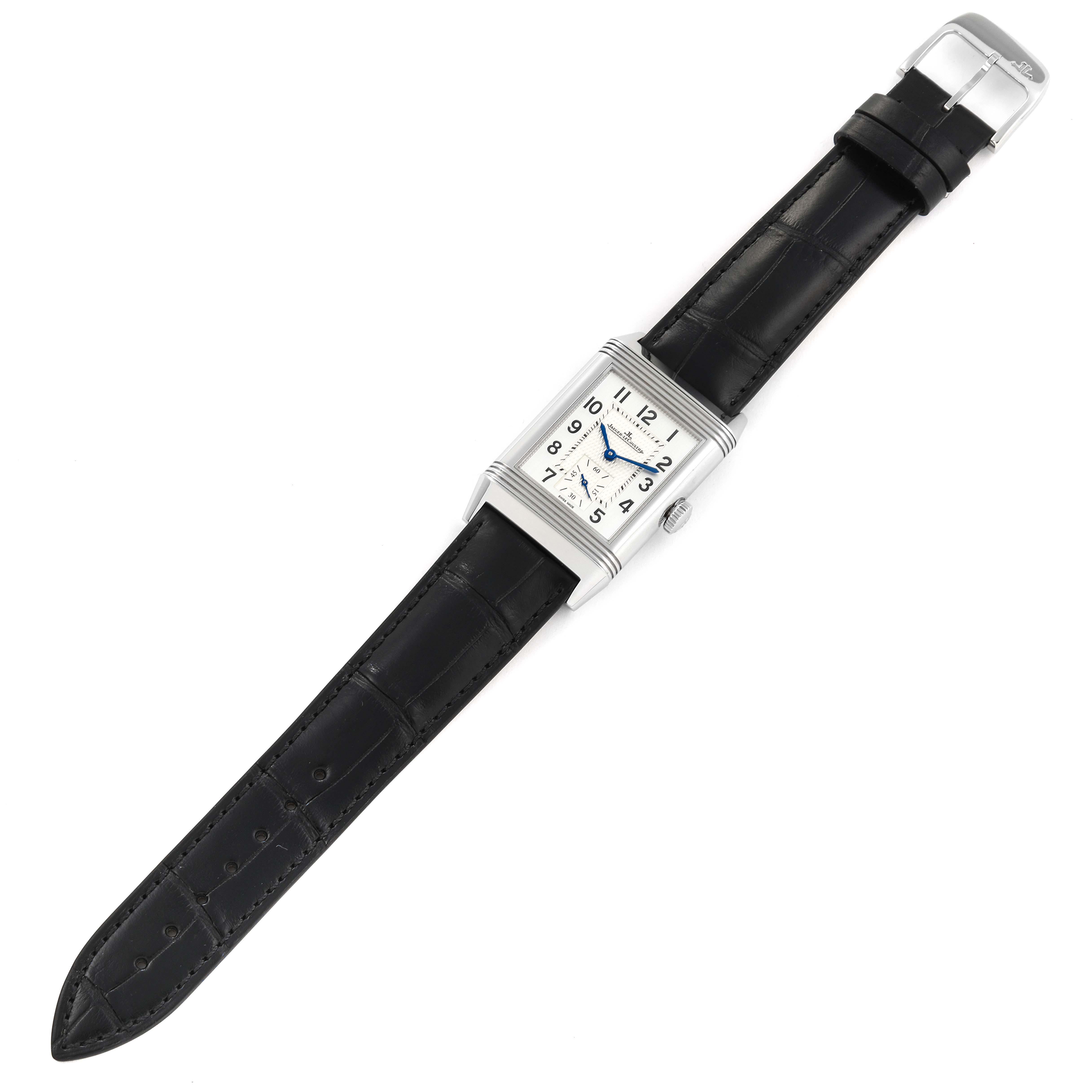 The Jaeger LeCoultre Reverso Q3858520 Men's Stainless Steel Silver Dial Q3858520 Men's Stainless Steel Silver Dial watch is shown fully extended, displaying its rectangular face, case, crown, and black leather strap.