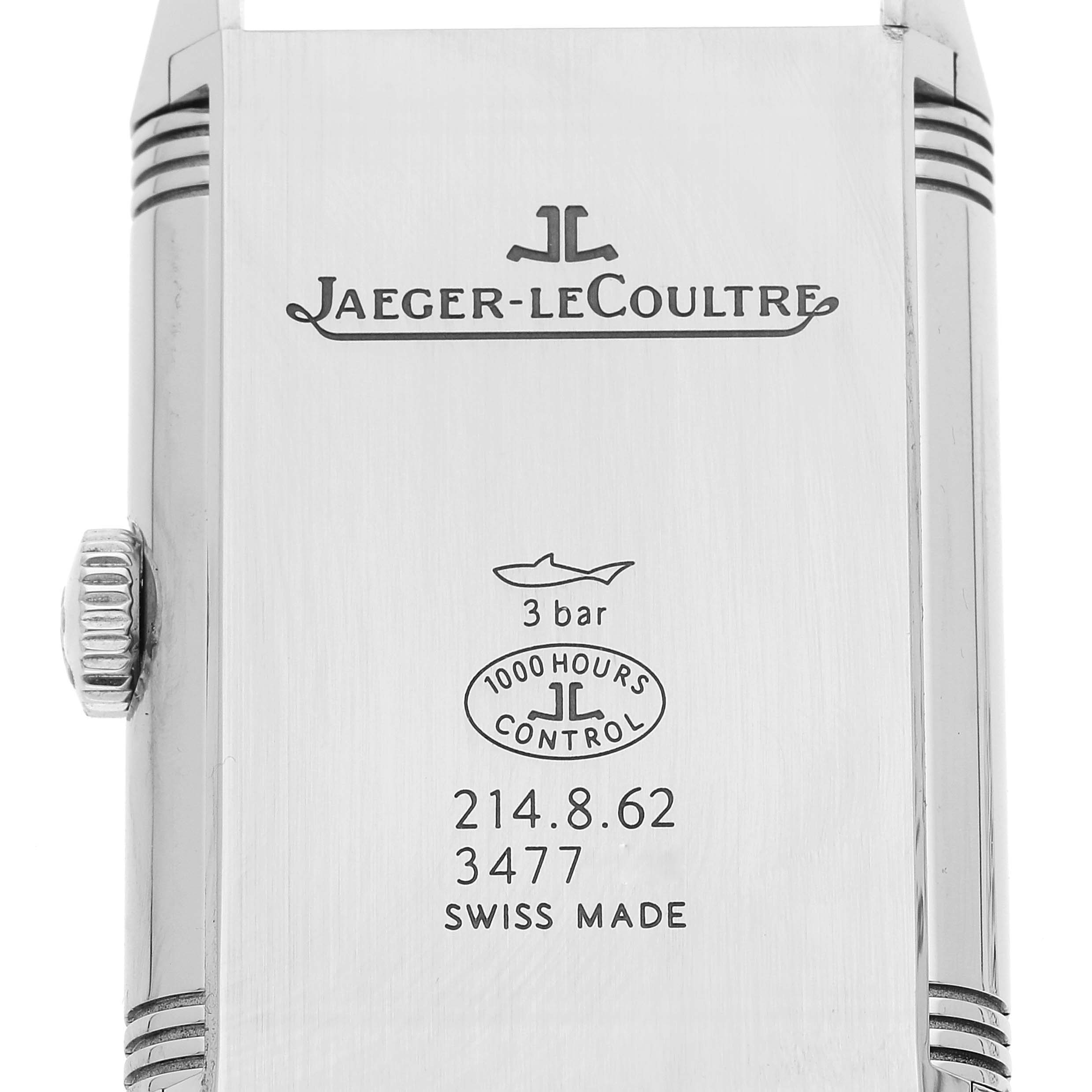 The image shows the case back of a Jaeger-LeCoultre Reverso watch, showcasing the brand logo, model details, and water resistance.