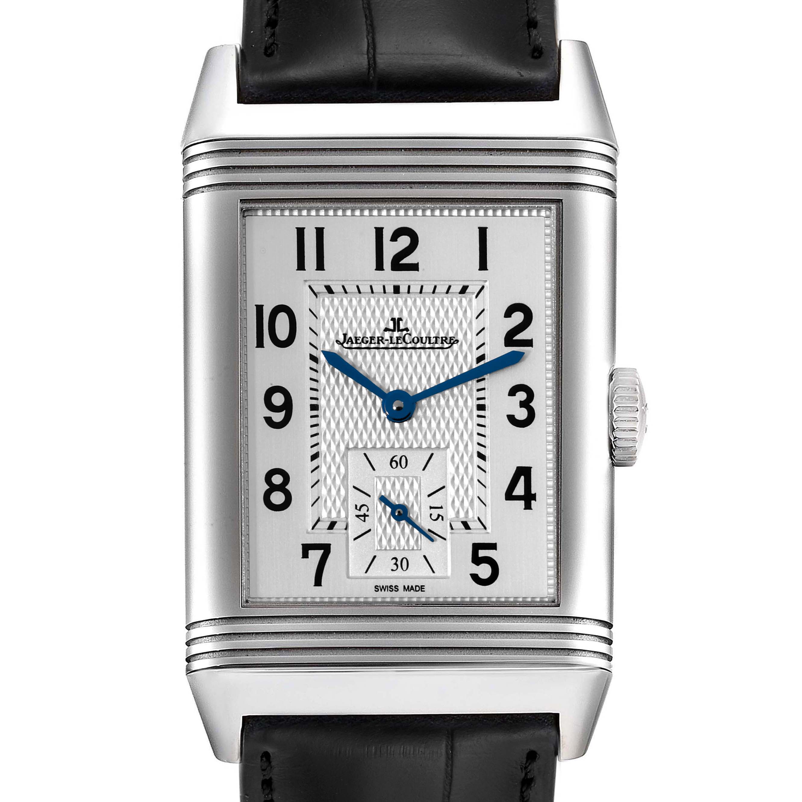 The image shows the front of a Jaeger-LeCoultre Reverso watch featuring its rectangular face, dial, and crown, with a black leather strap.