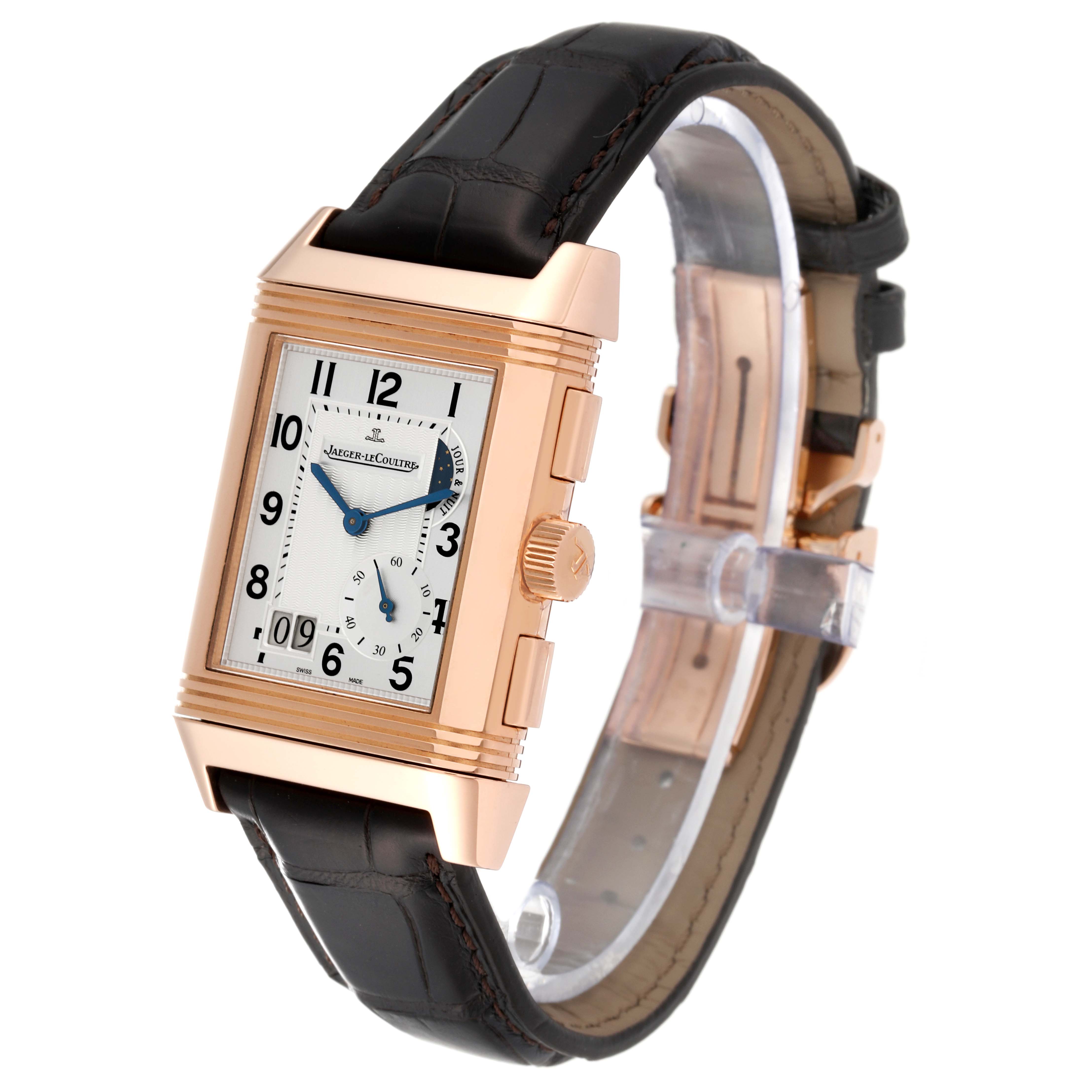 The watch is a Jaeger-LeCoultre Reverso, shown at a slight angle revealing the front dial, case, crown, and black leather strap.