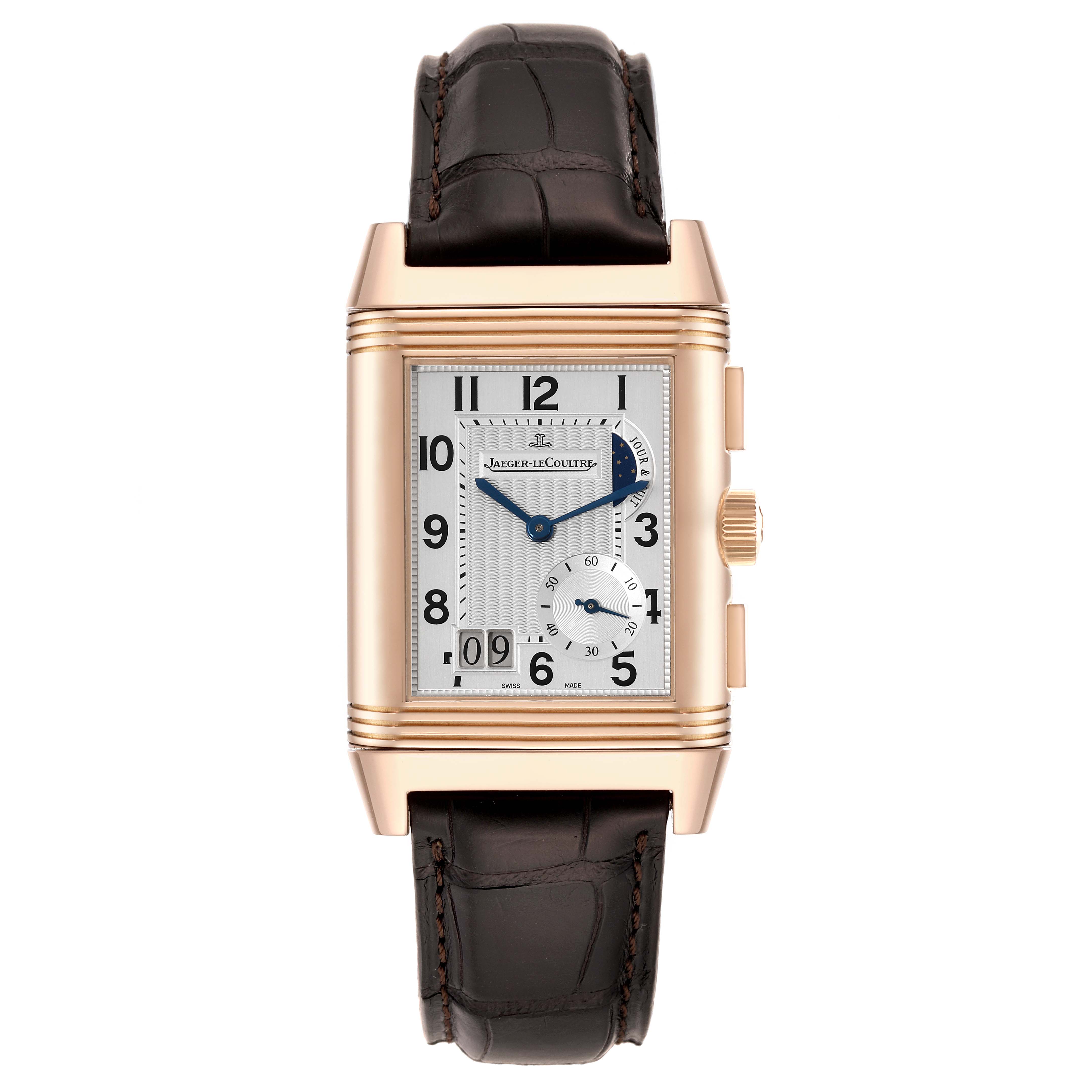 The image shows a frontal view of the Jaeger-LeCoultre Reverso watch, displaying its face, dial, crown, and leather strap.