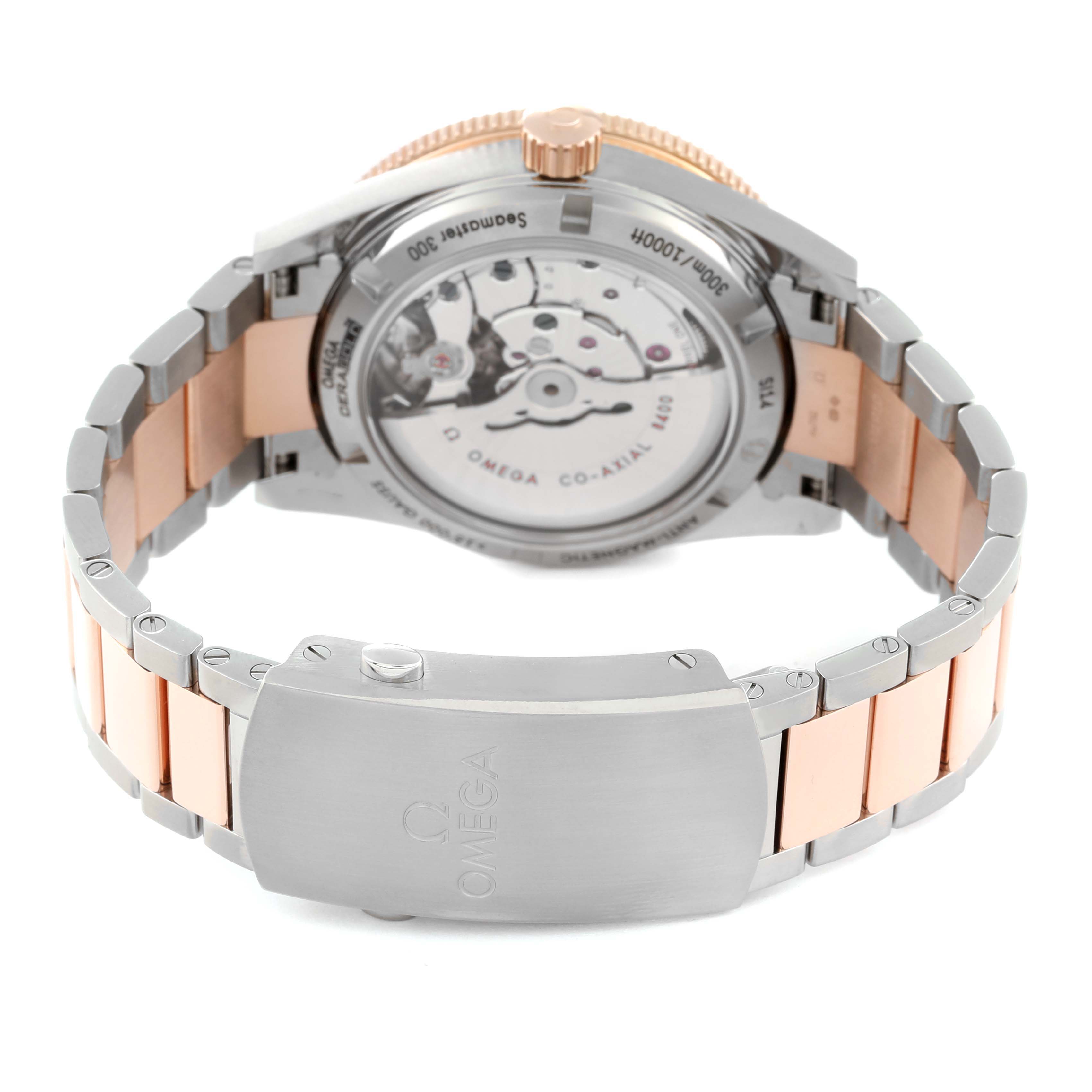 This image shows the back of the Omega Seamaster 233.60.41.21.03.001 Men's Titanium Blue Dial 233.60.41.21.03.001 Men's Titanium Blue Dial watch, highlighting the movement and the metal bracelet with a clasp.