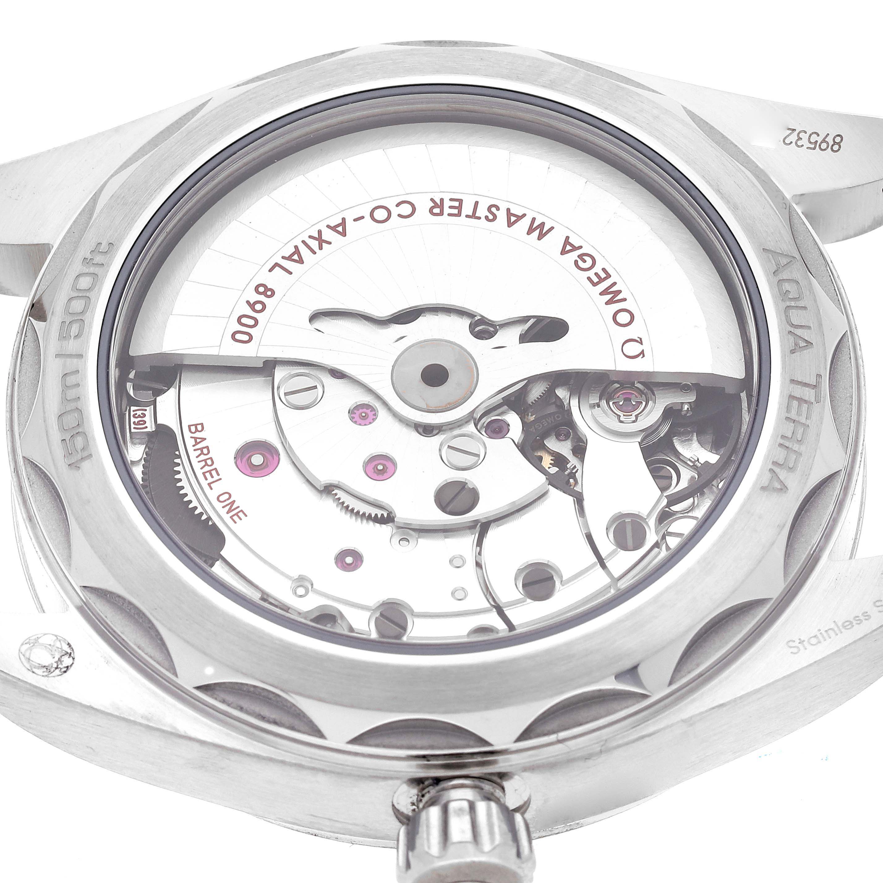 The image shows the back side of the Omega Aqua Terra 220.12.41.21.03.002 Men's Stainless Steel Blue Dial 220.12.41.21.03.002 Men's Stainless Steel Blue Dial watch, revealing its internal mechanism and "Co-Axial 8900" engraving.