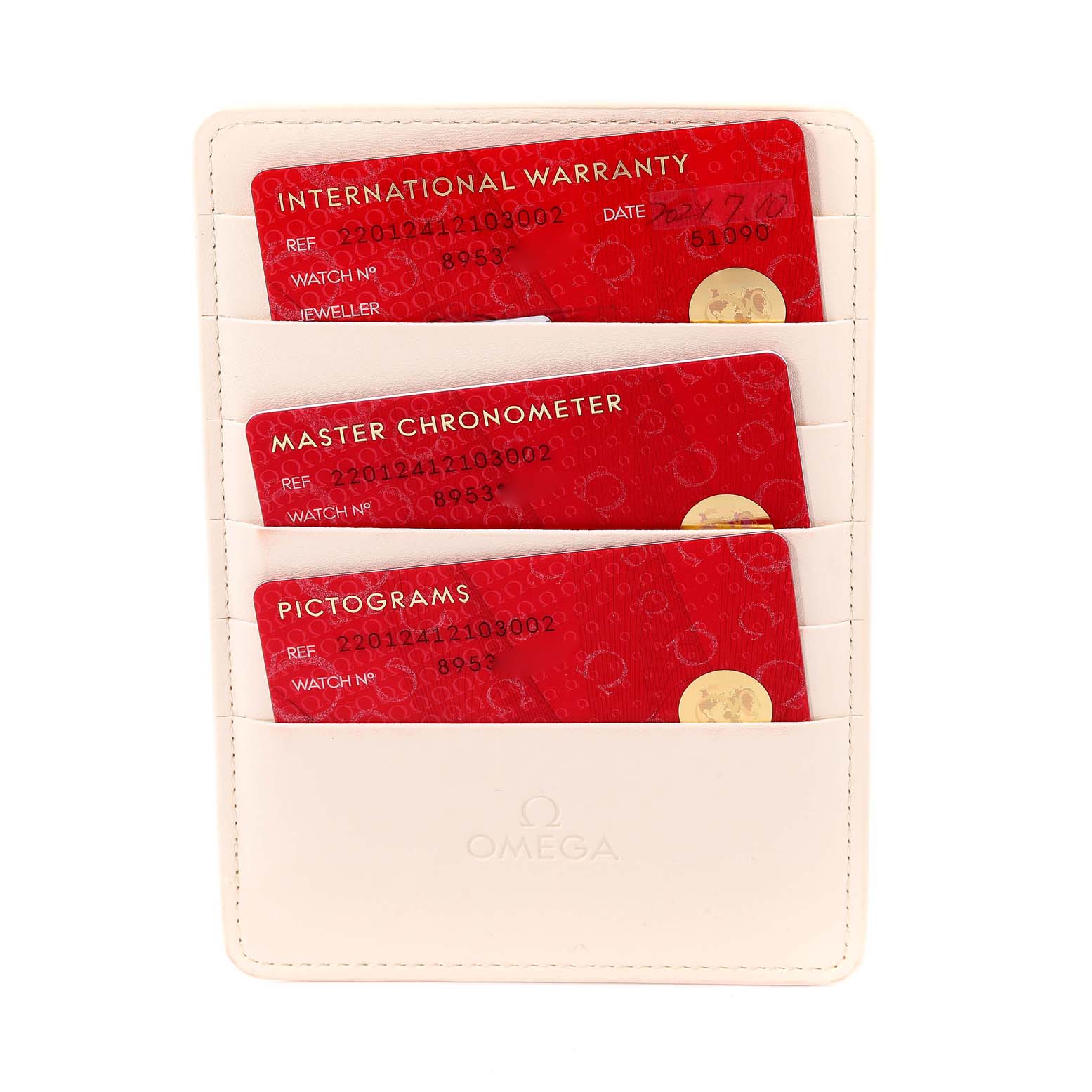 The image shows warranty and certification cards in a holder for an Omega Aqua Terra 220.12.41.21.03.002 Men's Stainless Steel Blue Dial 220.12.41.21.03.002 Men's Stainless Steel Blue Dial watch from a top-down angle.