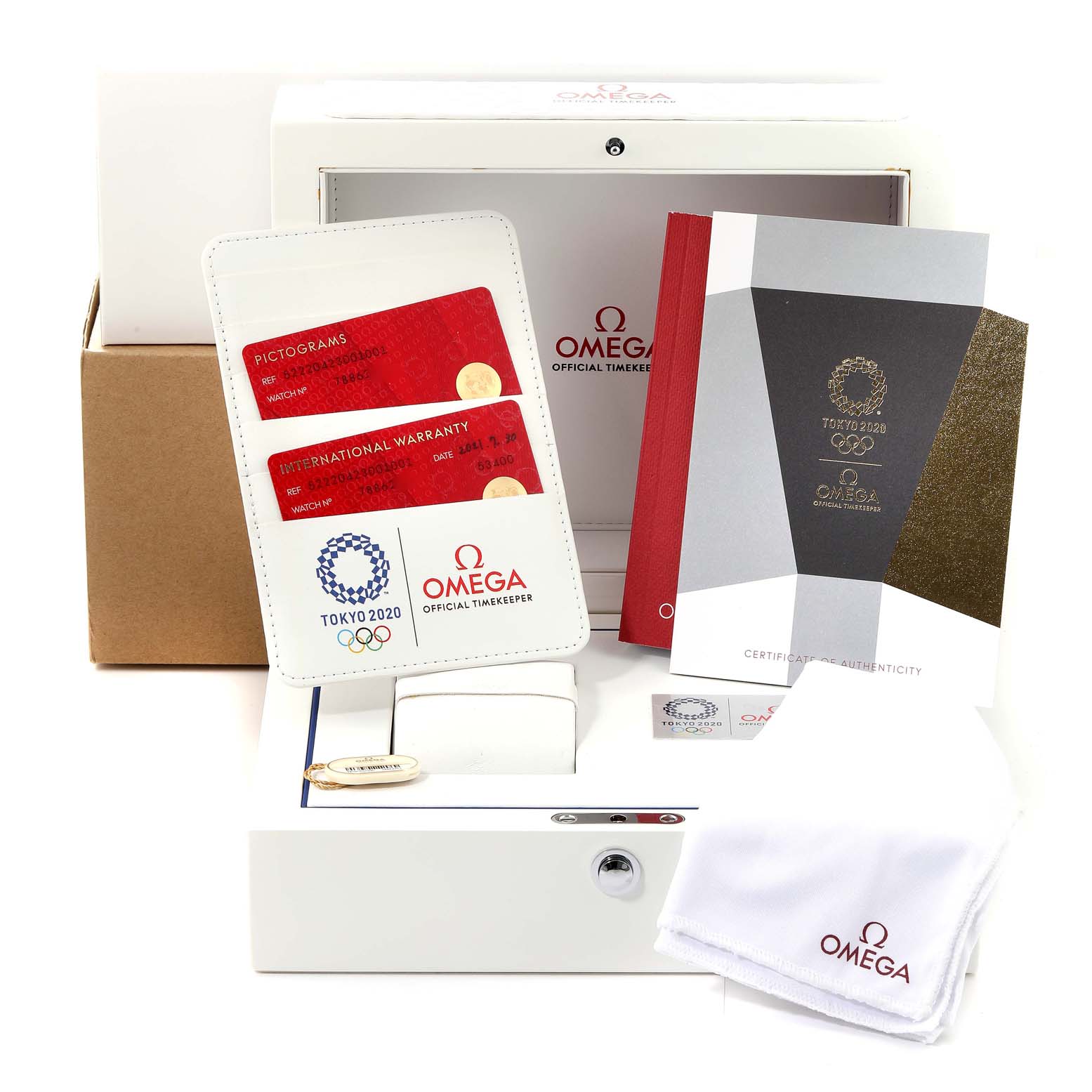 The image shows the packaging and accessories for the Omega Speedmaster 522.20.42.30.01.001 Men's Steel and Gold (two tone) Black Dial 522.20.42.30.01.001 Men's Steel and Gold (two tone) Black Dial, including warranty cards, booklet, cleaning cloth, and storage box.