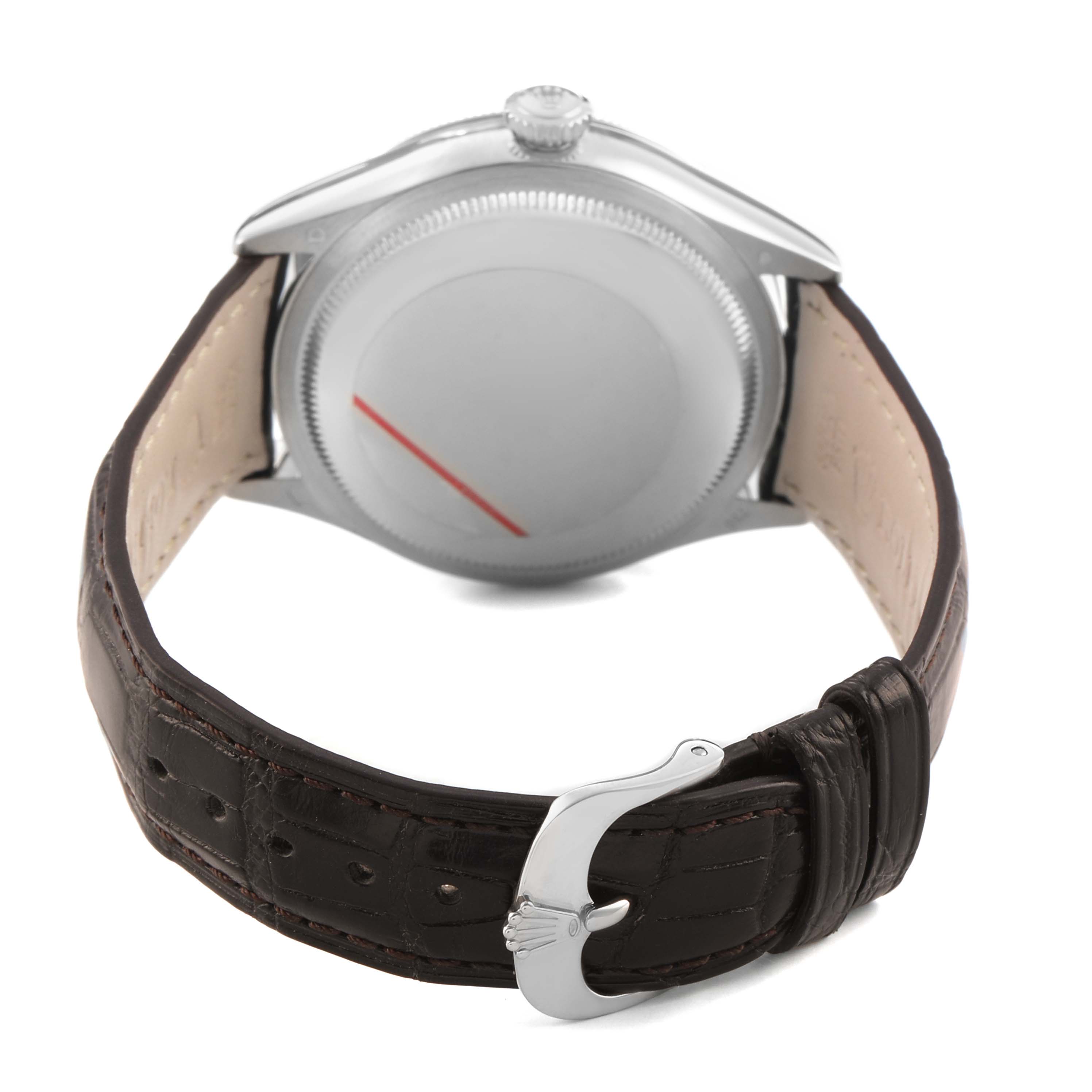 The image shows a rear angle of a Rolex Cellini 50529 Men's White Gold Silver Dial watch, highlighting the case back and leather strap with a clasp.