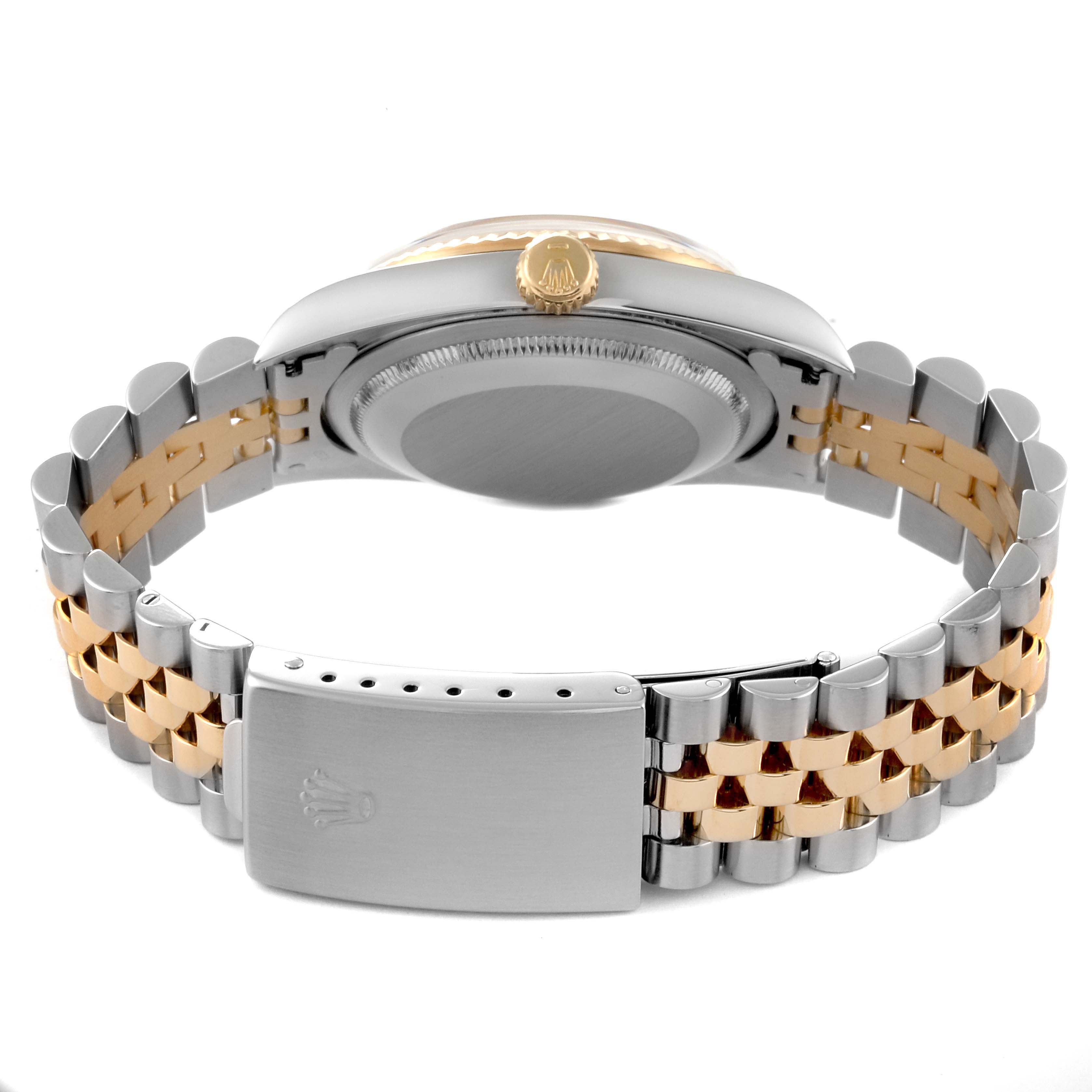 This image shows the back case, crown, and two-tone bracelet of the Rolex Datejust 16233 Men's Steel and Gold (two tone) Black Dial 16233 Men's Steel and Gold (two tone) Black Dial watch.