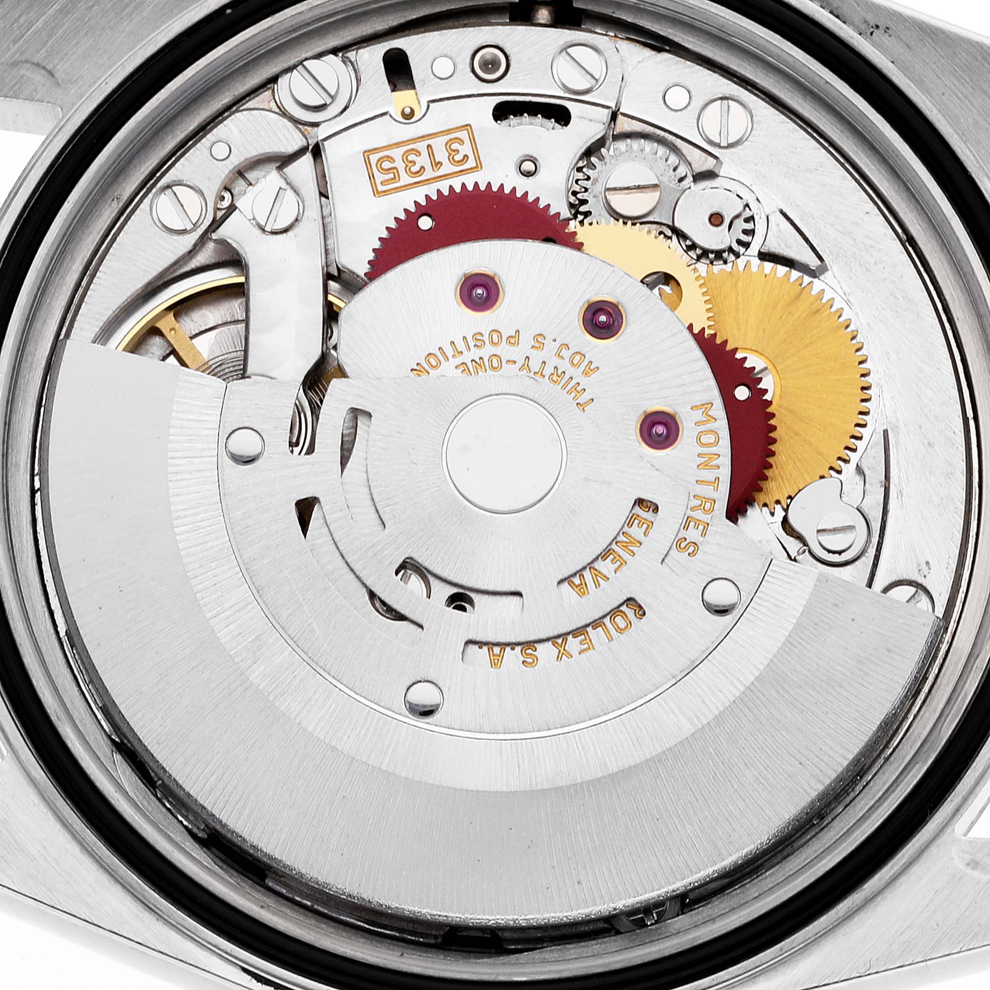 This image shows a close-up view of the intricate internal mechanical movement of a Rolex Datejust 16233 Men's Steel and Gold (two tone) Black Dial 16233 Men's Steel and Gold (two tone) Black Dial watch.
