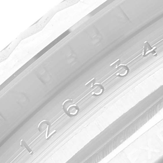 This image shows a close-up of the bezel and inner ring with engraved serial numbers on the Datejust 41 model by Rolex.