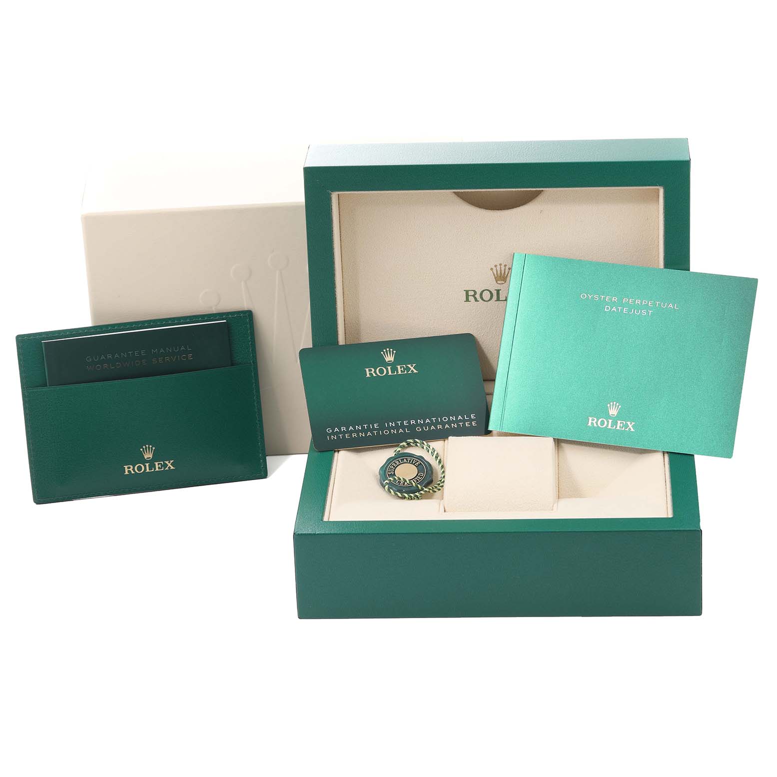 The image shows the Rolex Datejust 41 126334 Men
s Stainless Steel Green Dial 126334 Men
s Stainless Steel Green Dial model
s box, guarantee manual, warranty card, and instruction manual.