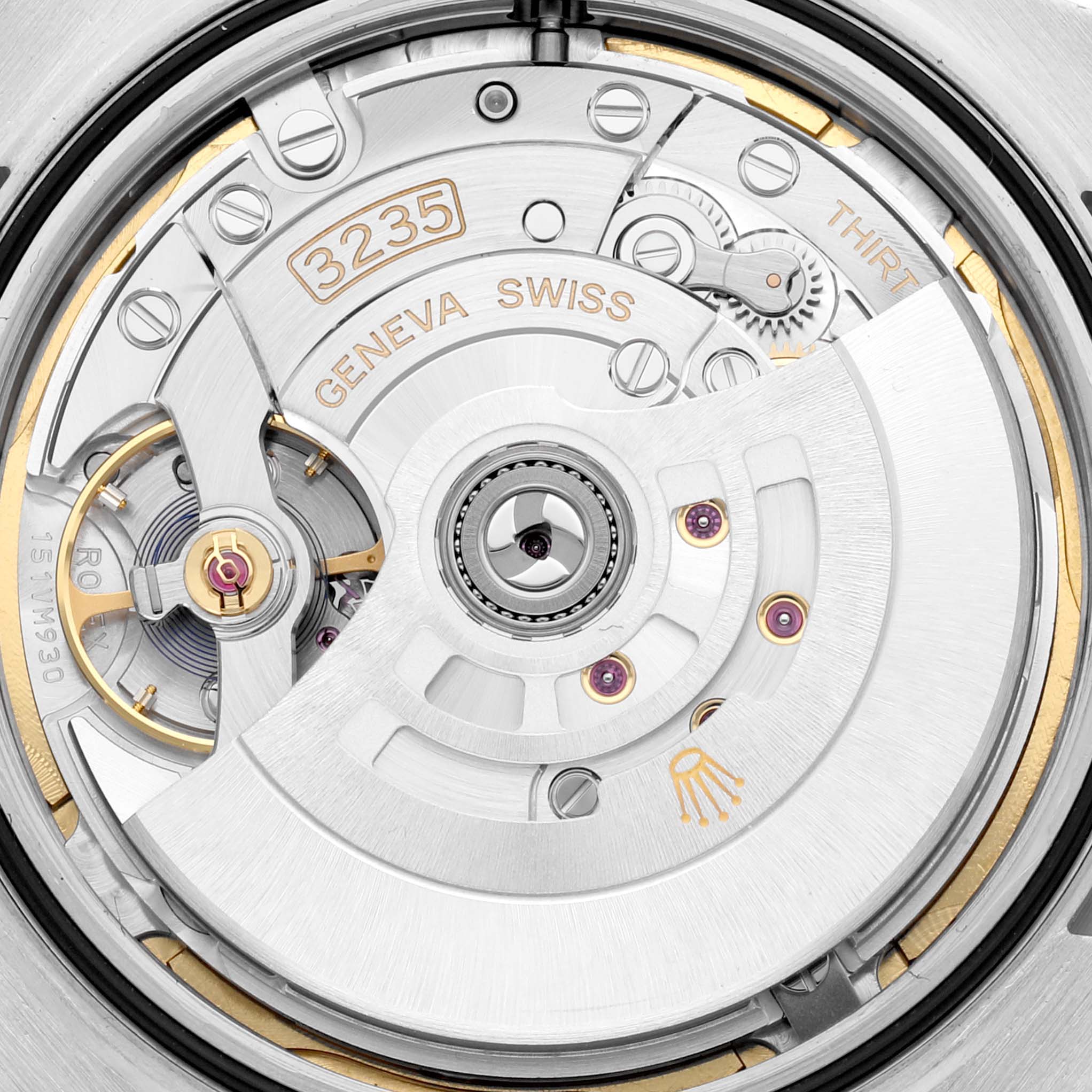 The image shows the intricate internal movement of a Rolex Datejust 41 126334 Men
s Stainless Steel Green Dial 126334 Men
s Stainless Steel Green Dial watch, highlighting the "3235" caliber.