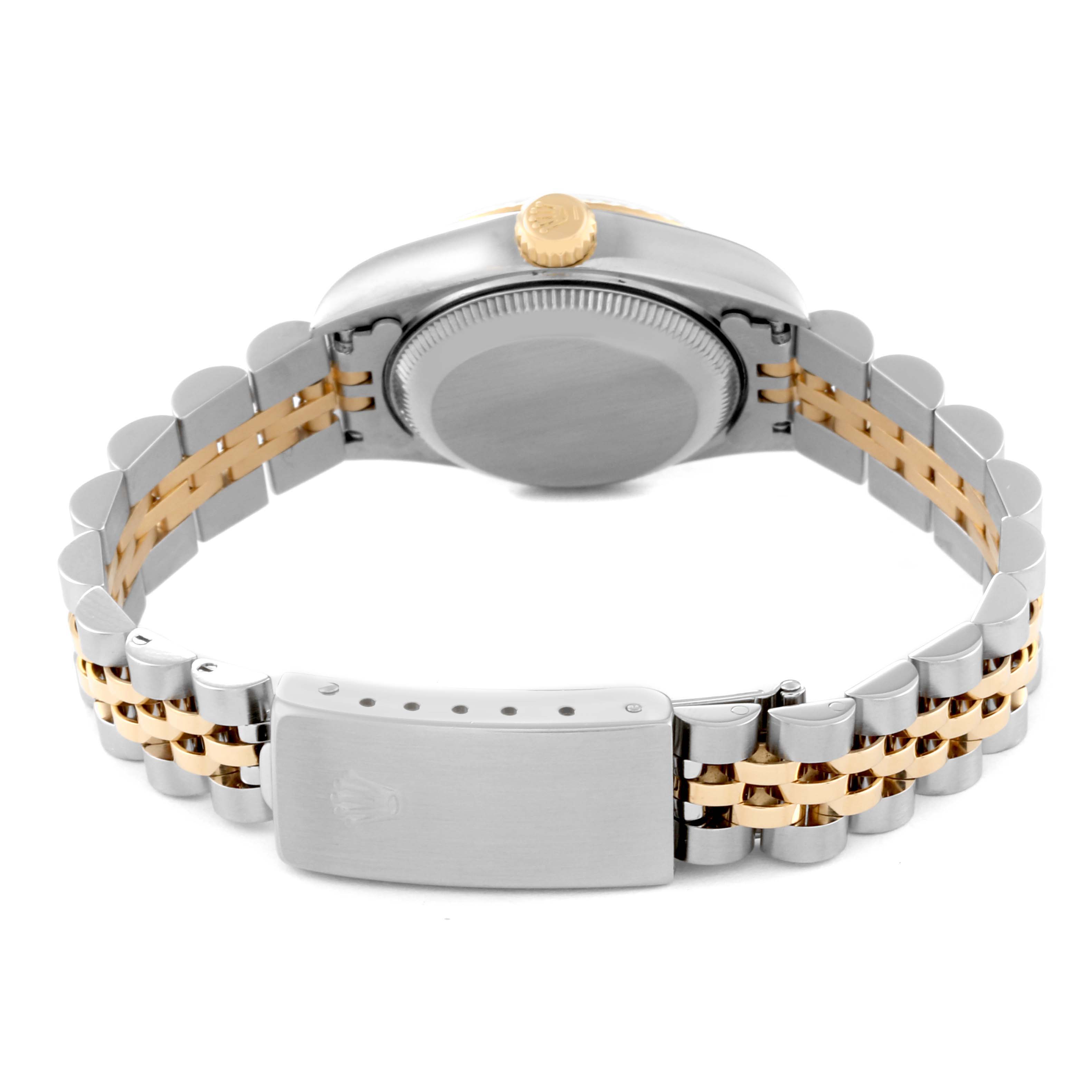 The image shows the back side of the Rolex Datejust 69173 Women's Steel and Gold (two tone) Champagne Dial 69173 Women's Steel and Gold (two tone) Champagne Dial watch, highlighting its clasp, bracelet, and case back.