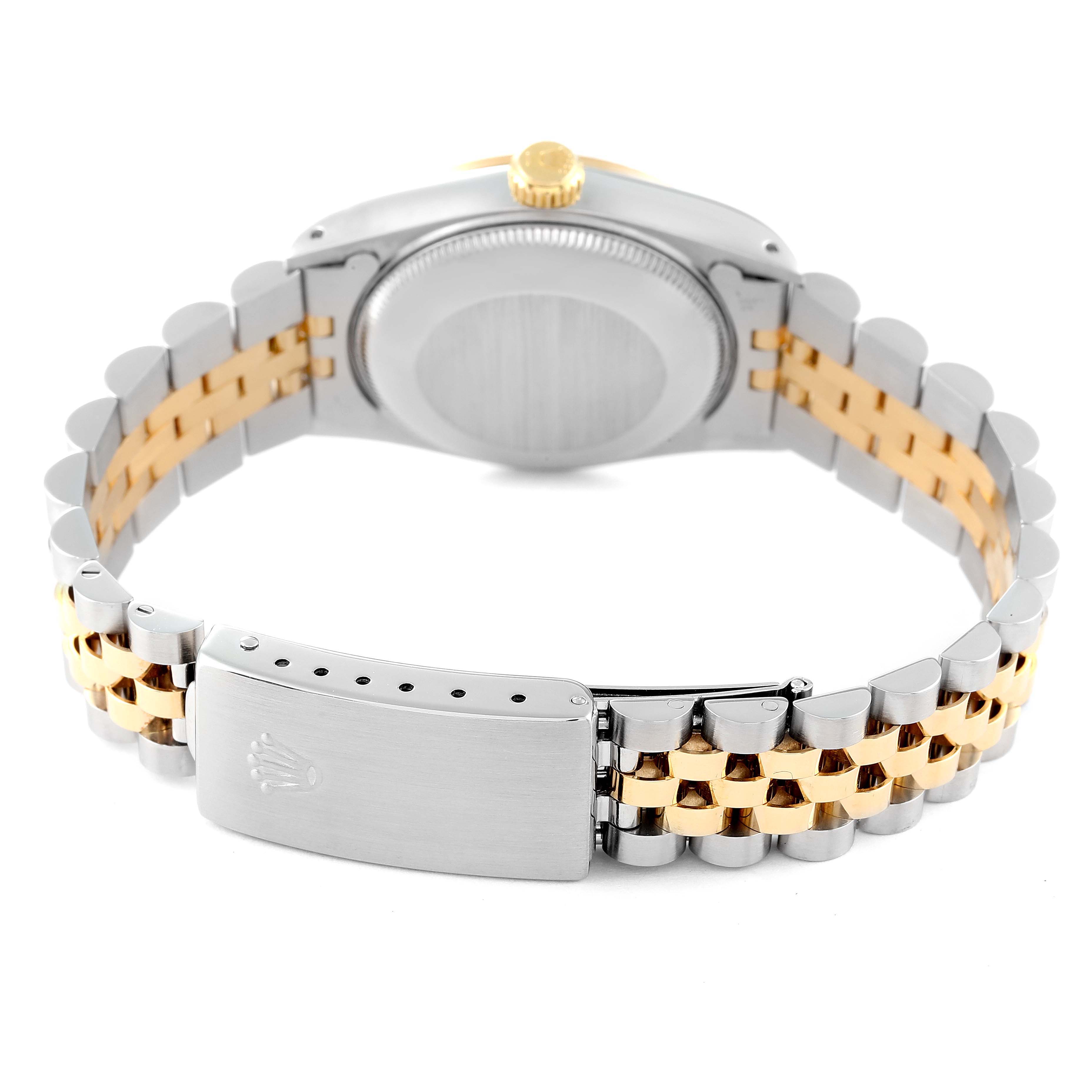The image shows the back of a Rolex Mid-Size 68273 Women
s Steel and Gold (two tone) Champagne Dial 68273 Women
s Steel and Gold (two tone) Champagne Dial watch, highlighting the case, crown, and two-tone Jubilee bracelet with the clasp.