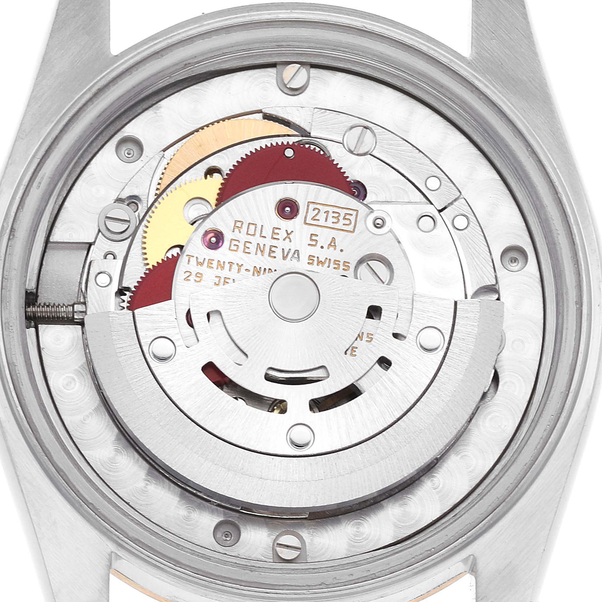 The image shows the inner workings and mechanical movement of a Rolex Mid-Size 68273 Women
s Steel and Gold (two tone) Champagne Dial 68273 Women
s Steel and Gold (two tone) Champagne Dial model watch from a back angle.