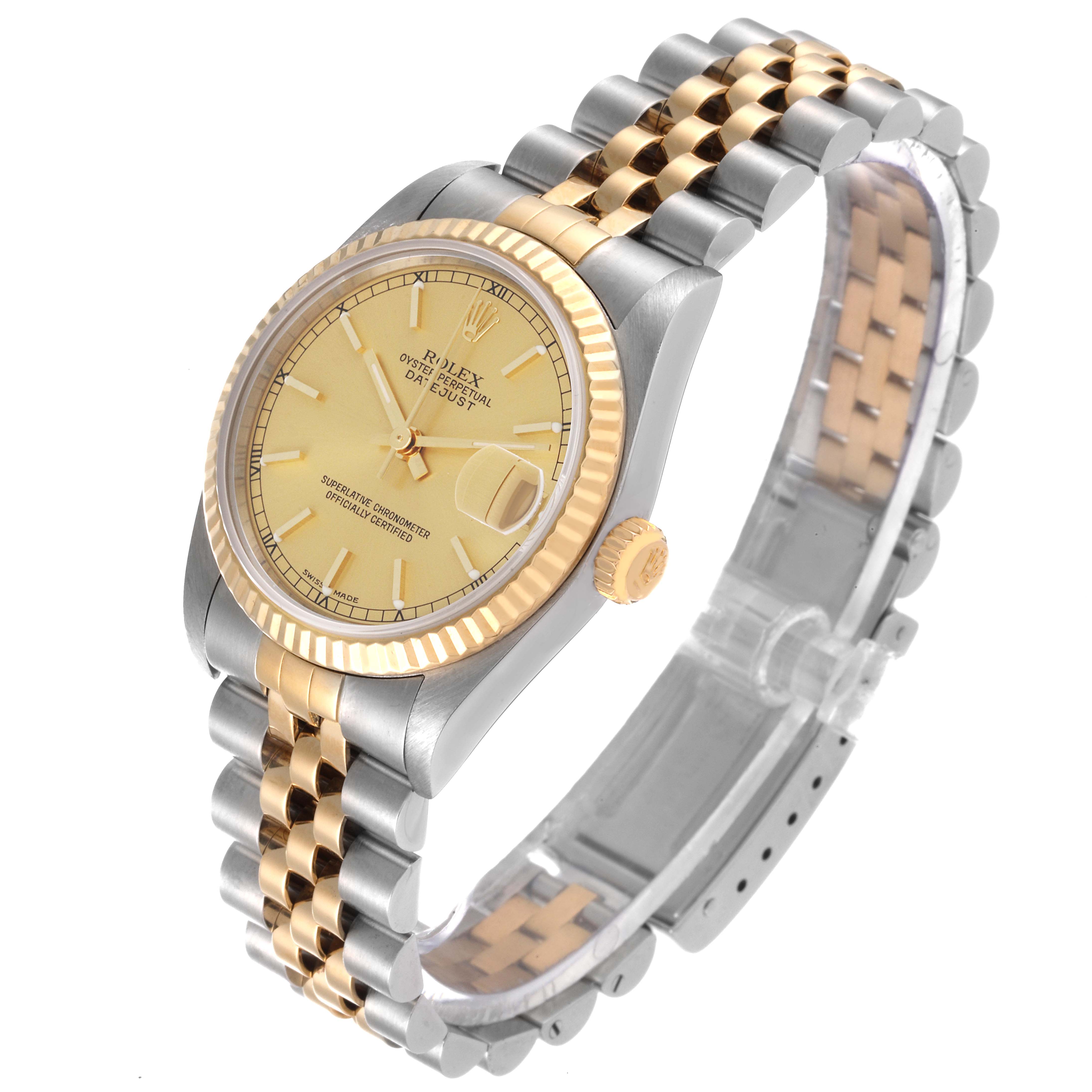 The image shows a Mid-Size Rolex watch at a slight angle, highlighting its dial, bezel, crown, and two-tone bracelet.