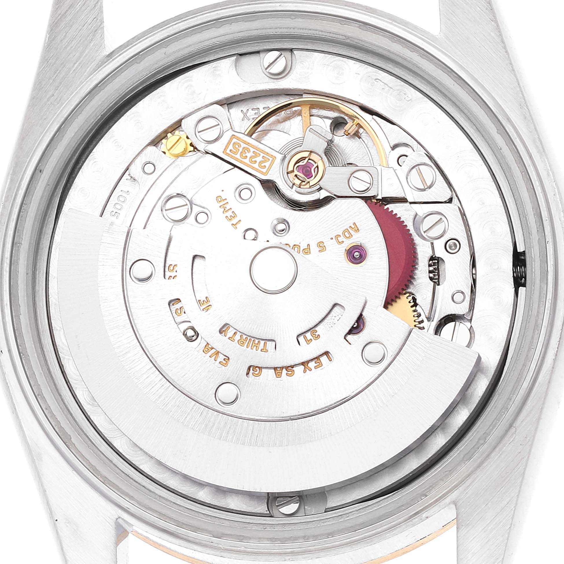 This image shows the internal mechanism and movement parts of a Rolex Mid-Size 78273 Women's Steel and Gold (two tone) Champagne Dial 78273 Women's Steel and Gold (two tone) Champagne Dial model watch from a rear view.