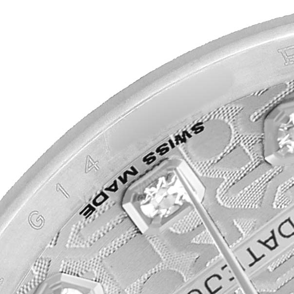 The image shows a close-up of a Rolex Datejust 179174 Women's Stainless Steel Silver Dial watch dial, focusing on the hour markers and the "SWISS MADE" text.