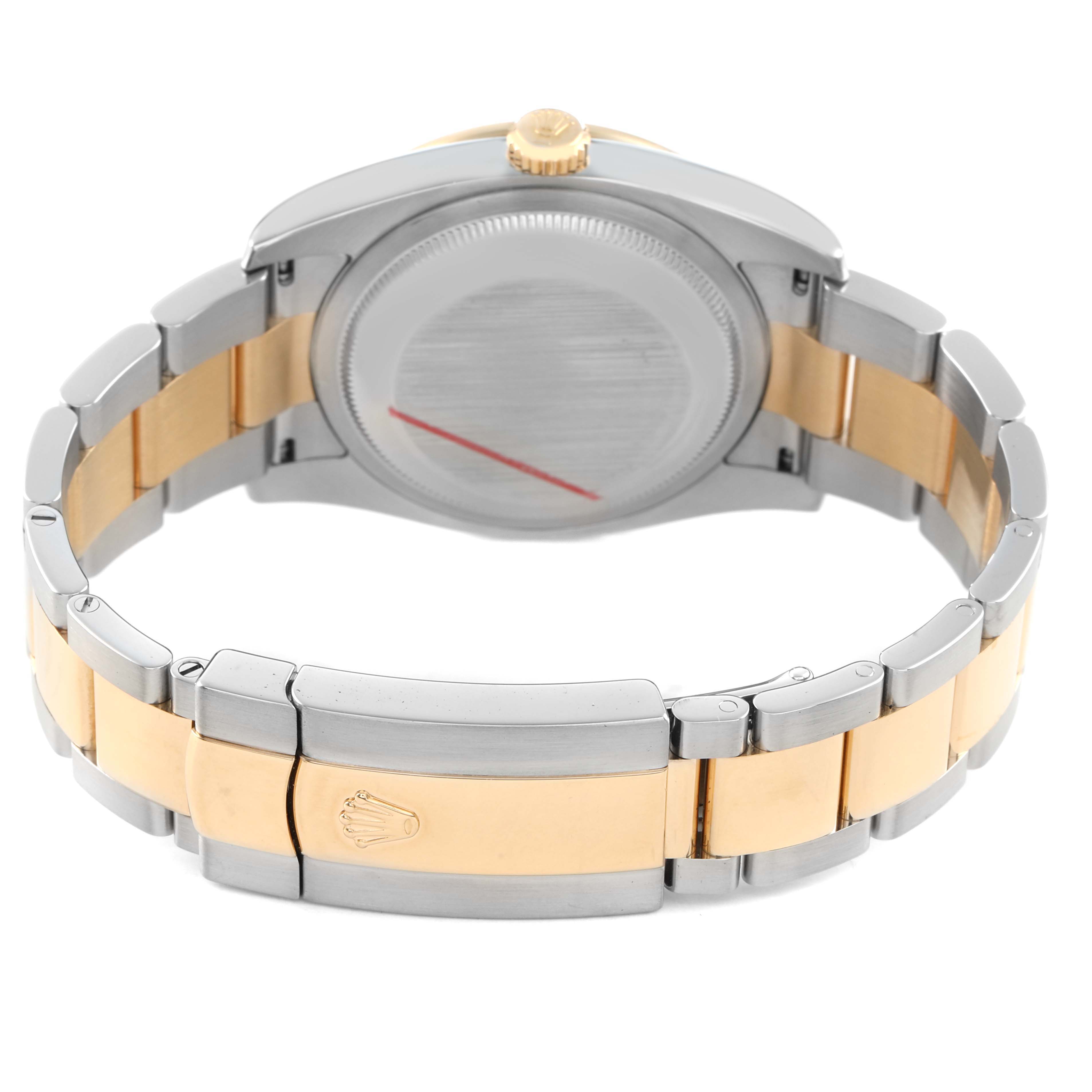 The image shows the case back and bracelet of a Rolex Datejust 116243 Men's Steel and Gold (two tone) Silver Dial, viewed from the rear angle.