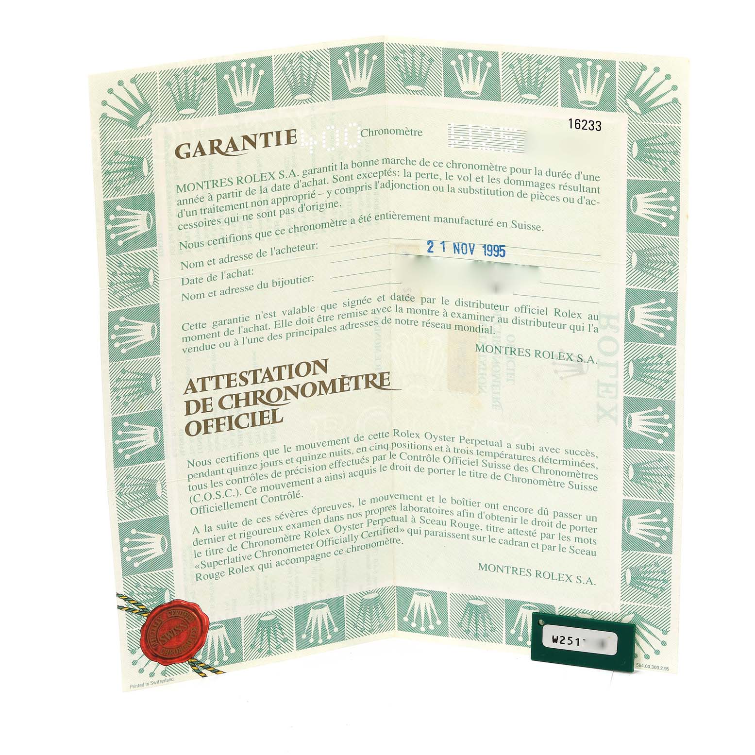 The image shows an official warranty certificate for the Rolex Datejust 16233 Men's Steel and Gold (two tone) White Dial 16233 Men's Steel and Gold (two tone) White Dial model, displaying its folded layout with text and a seal.