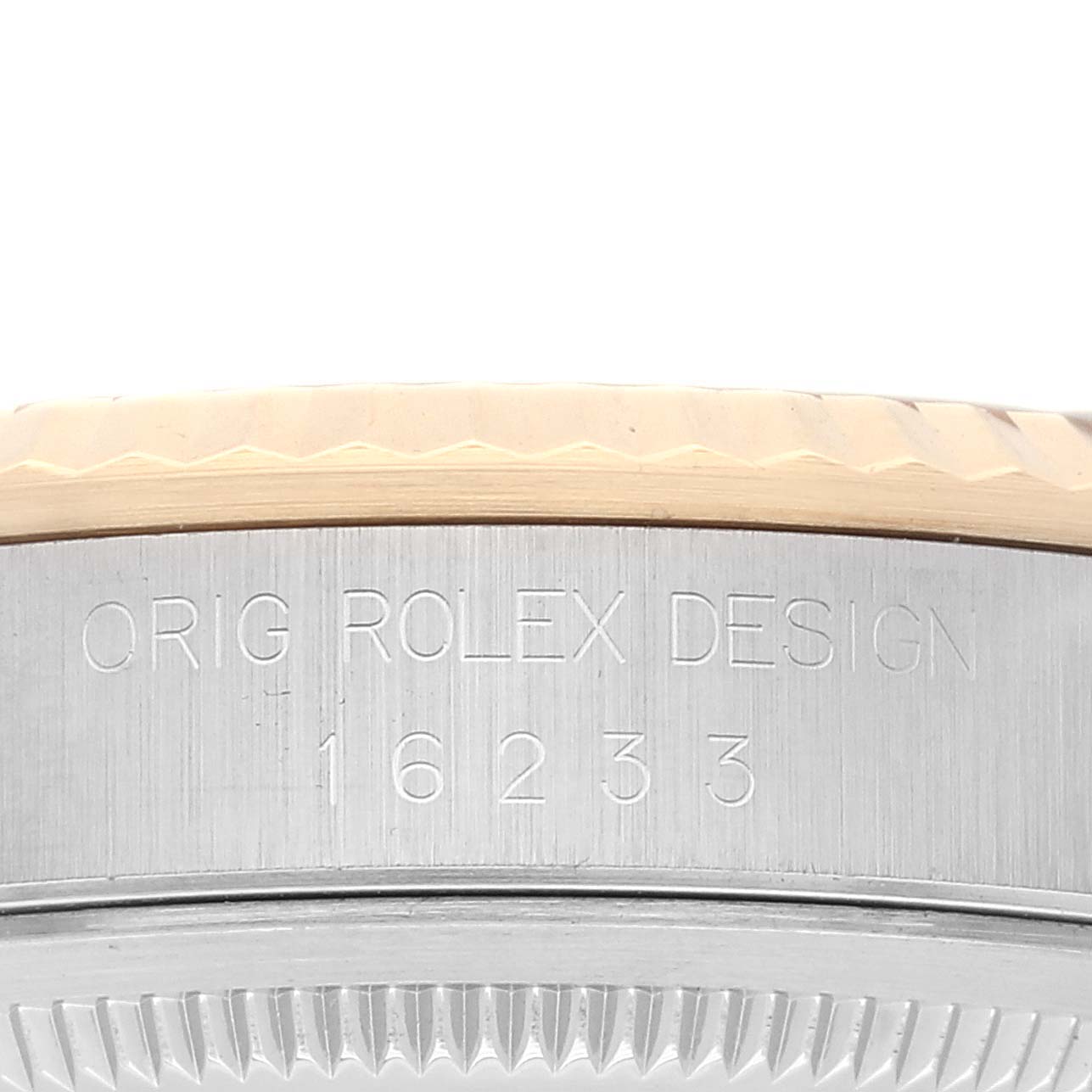 This image shows a close-up of the case side and edge of the bezel of a Rolex Datejust 16233 Men's Steel and Gold (two tone) White Dial 16233 Men's Steel and Gold (two tone) White Dial watch, displaying the model number 16233.