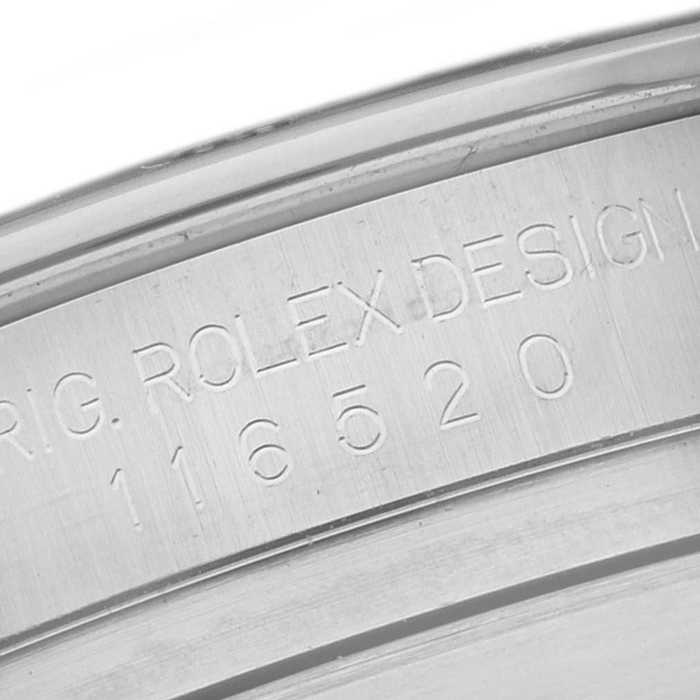 This is a close-up of the inner case engraving on a Rolex Daytona 116520 Men's Stainless Steel Black Dial 116520 Men's Stainless Steel Black Dial model, showing its design and model number "116520."