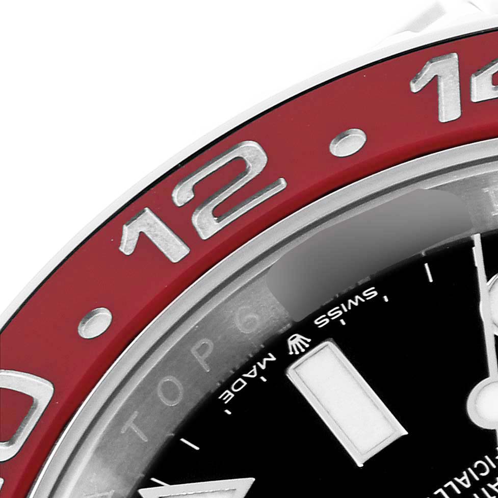 The image shows a close-up of the bezel, dial, and part of the hands of a Rolex GMT-Master 126710BLRO Men
s Stainless Steel Black Dial 126710BLRO Men
s Stainless Steel Black Dial watch.
