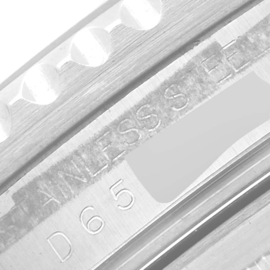 This image shows a close-up view of the stainless steel details and serial number engraving on the Rolex GMT-Master 16710 Men's Stainless Steel Black Dial 16710 Men's Stainless Steel Black Dial.
