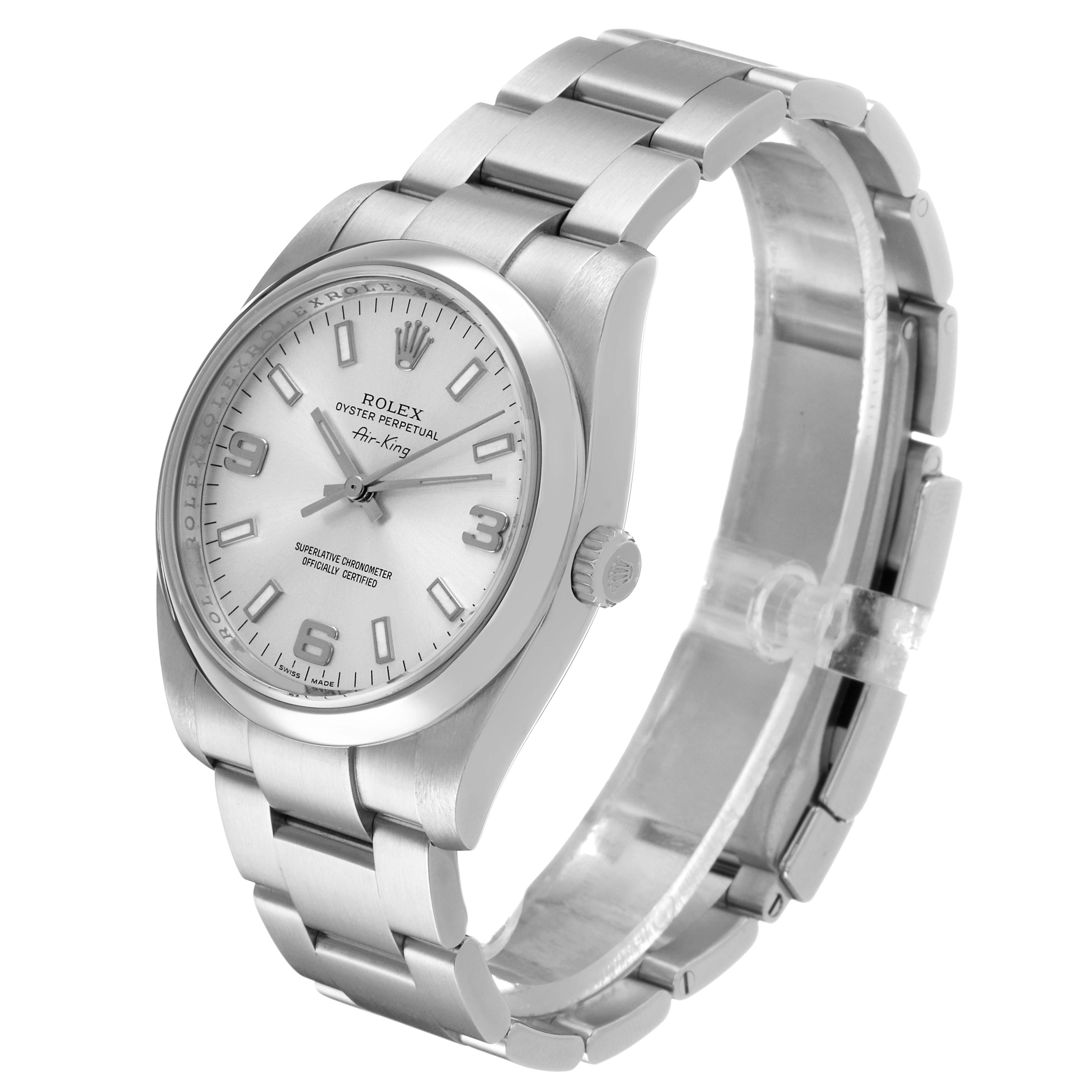 The Rolex Air-King 114200 Men's Stainless Steel Silver Dial watch is shown at an angled side view, displaying the face, bezel, bracelet, and crown.
