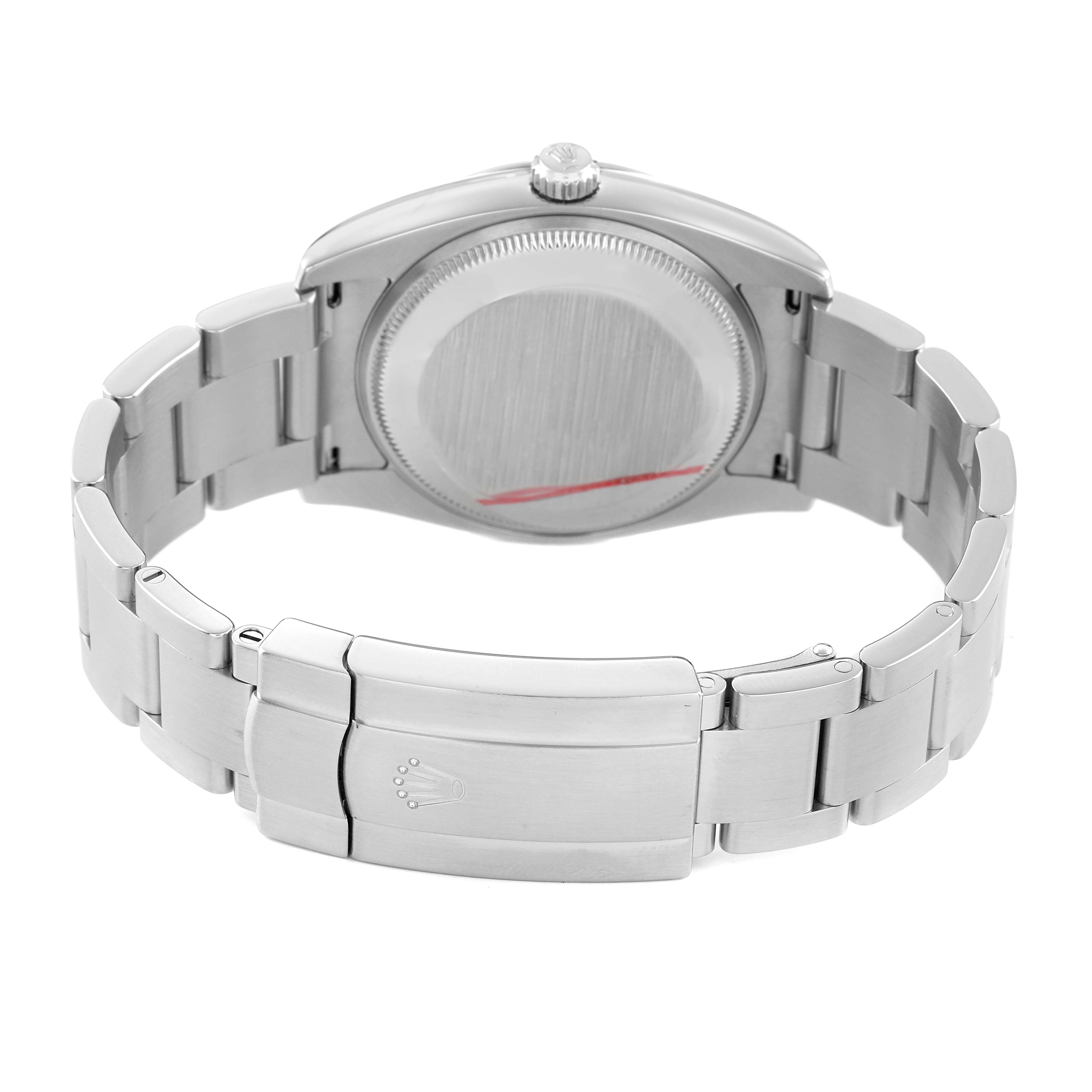 The image shows the back case and clasp of a Rolex Air-King 114200 Men's Stainless Steel Silver Dial, displaying its bracelet and logo.