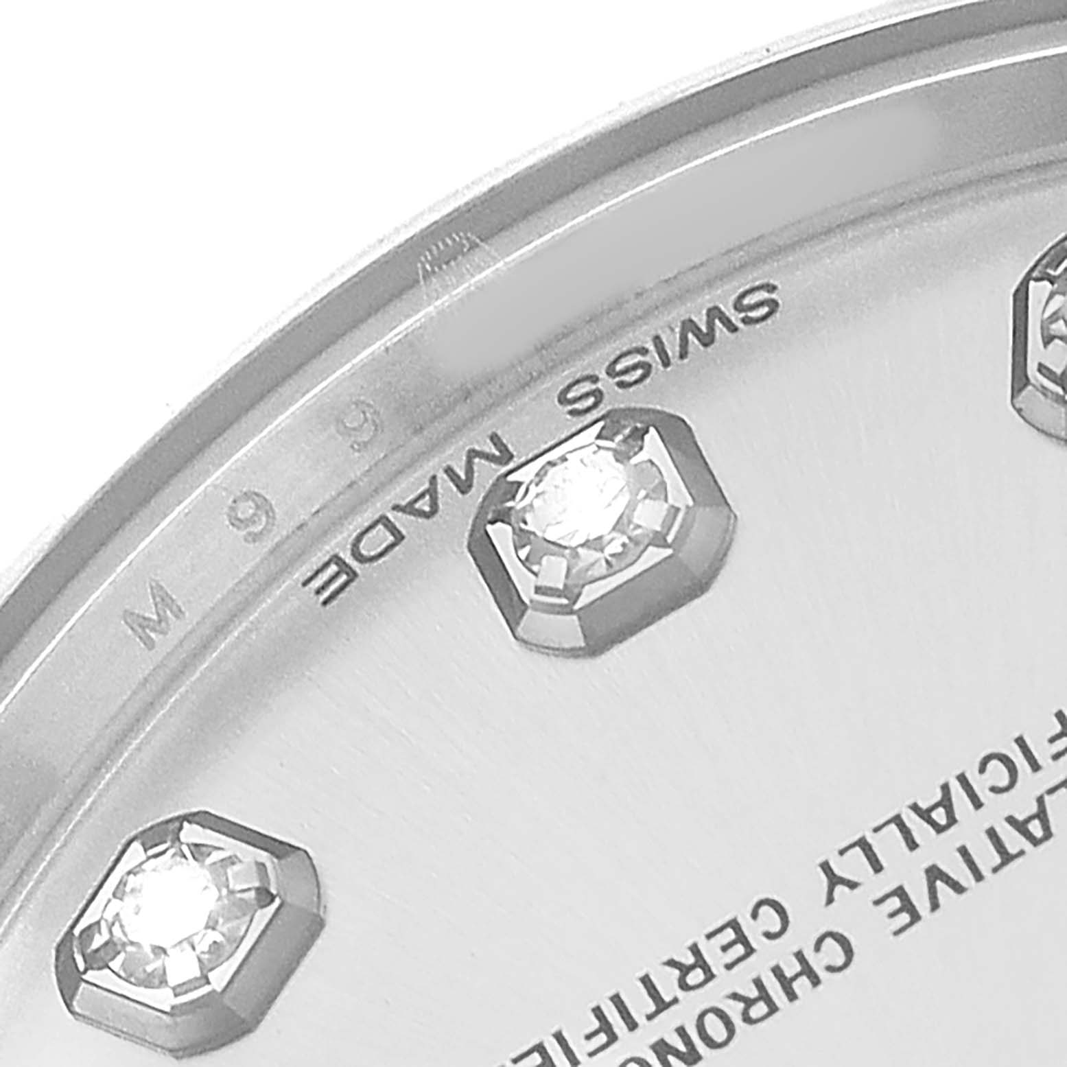 The image shows a close-up of the dial of a Rolex President 178279 Women's White Gold Silver Dial model, highlighting the diamonds and "Swiss Made" text.
