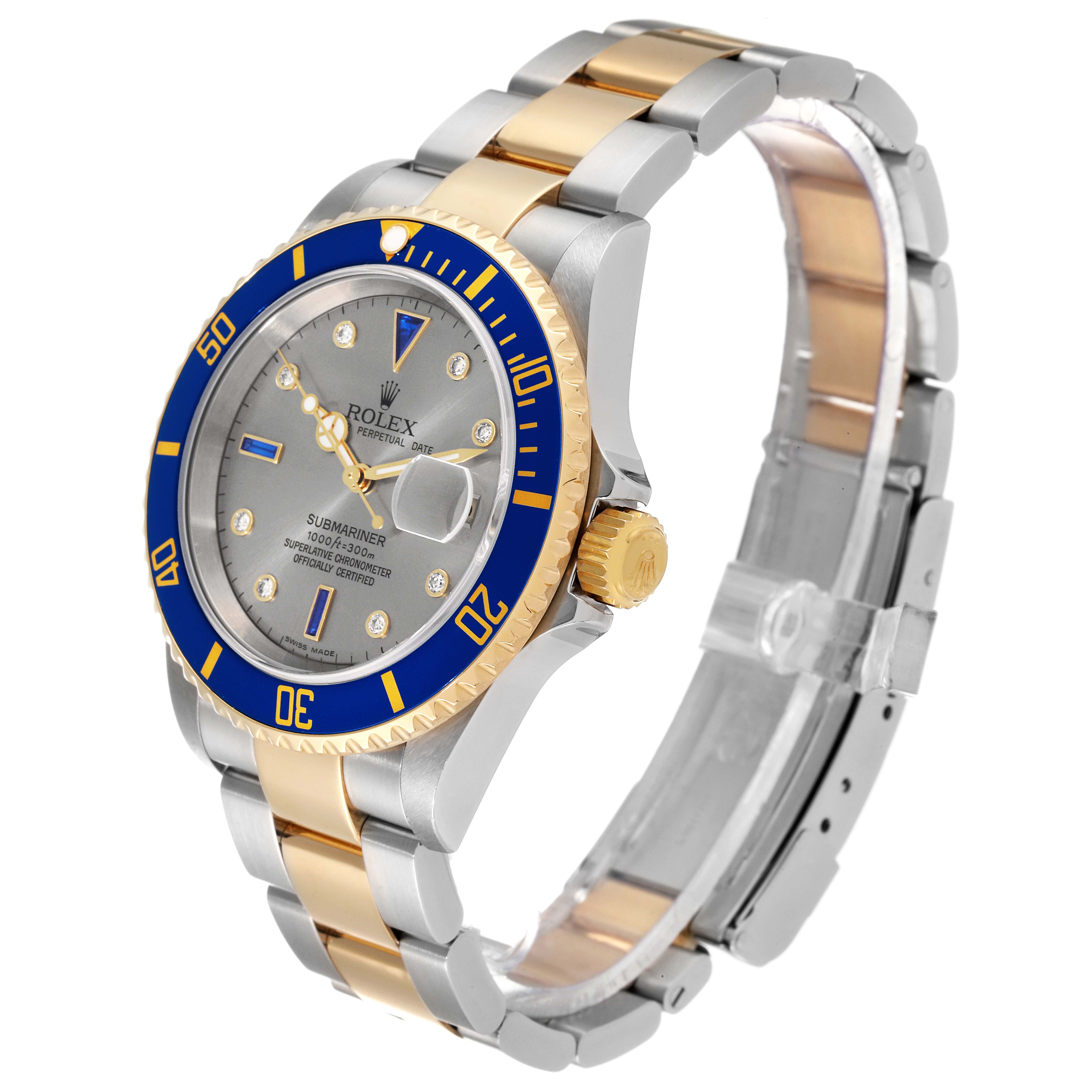 The Rolex Submariner 16613T Men's Steel and Gold (two tone) Grey Dial 16613T Men's Steel and Gold (two tone) Grey Dial watch is shown at a three-quarter angle, highlighting its bezel, dial, crown, and two-tone bracelet.