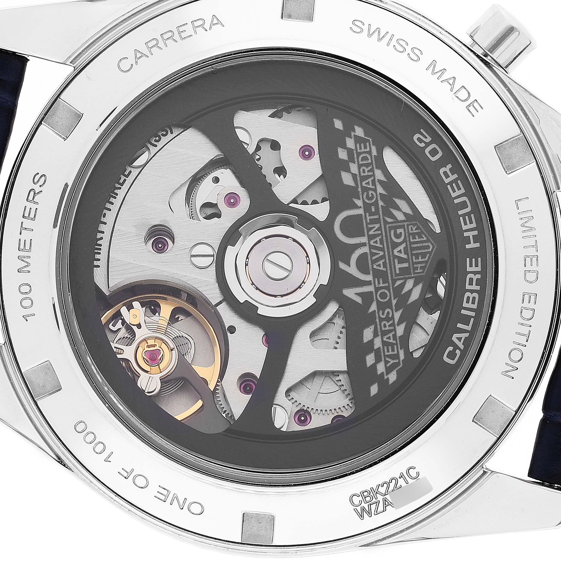 The image shows the back view of a Tag Heuer Carrera CBK221C.FC6488 Men's Stainless Steel White Dial CBK221C.FC6488 Men's Stainless Steel White Dial watch, revealing its mechanical movement and inscriptions.