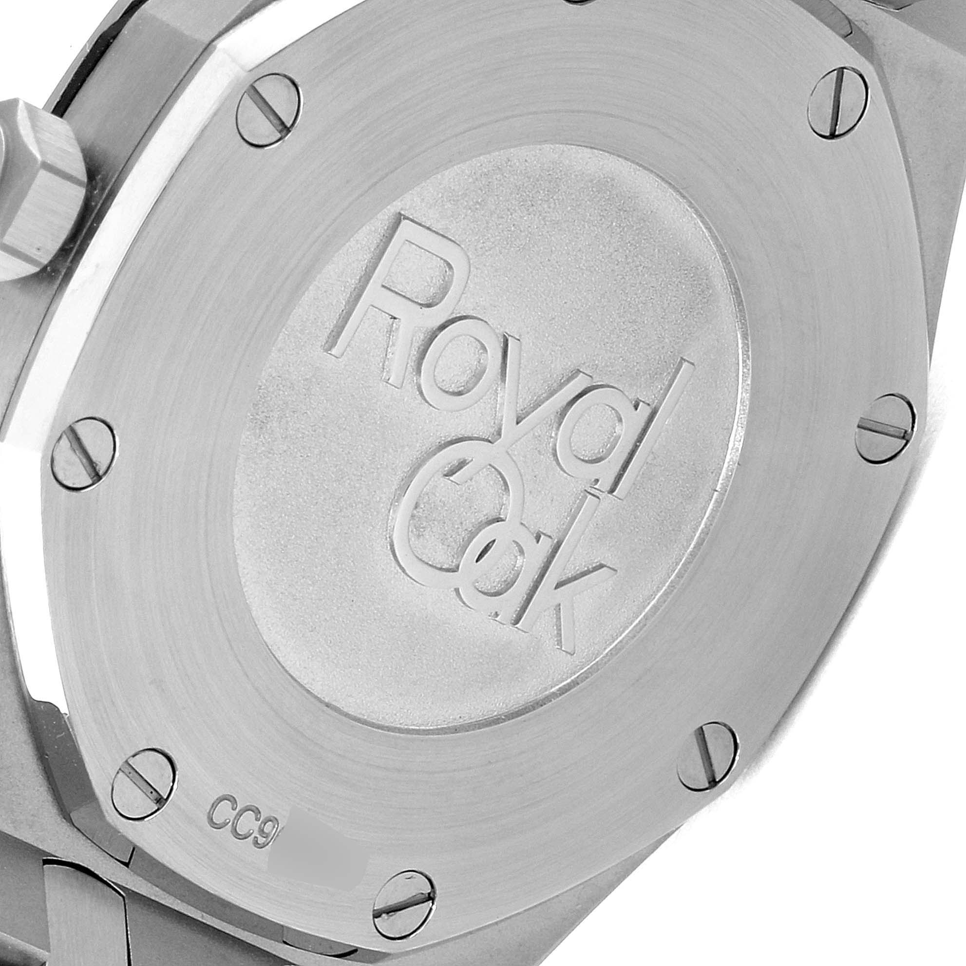 The image shows the case back of an Audemars Piguet Royal Oak 67650ST.OO.1261ST.01 Women's Stainless Steel Black Dial 67650ST.OO.1261ST.01 Women's Stainless Steel Black Dial watch, featuring the engraved "Royal Oak" logo and secured with screws.