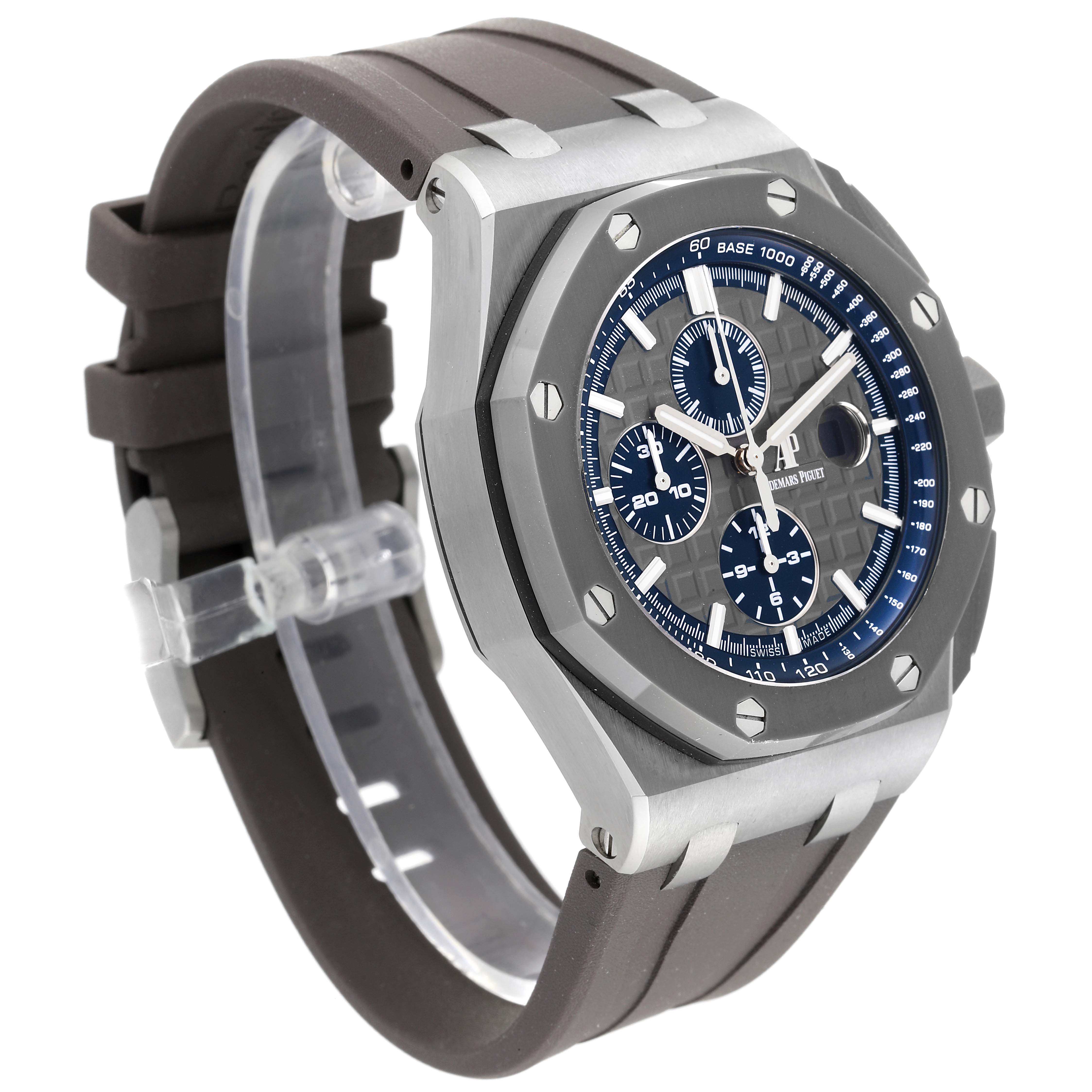 The image shows an angled side view of an Audemars Piguet Royal Oak Offshore 26400IO.OO.A004CA.02 Men's Titanium Grey Dial 26400IO.OO.A004CA.02 Men's Titanium Grey Dial watch, highlighting the face, bezel, and strap.