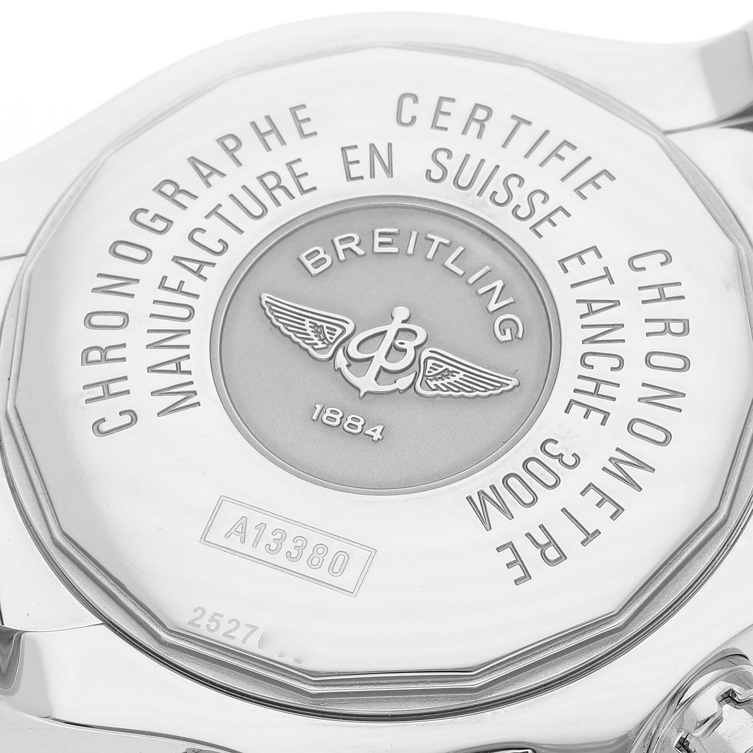 This image shows the back case of a Breitling Avenger A13380 Men's Stainless Steel Blue Dial A13380 Men's Stainless Steel Blue Dial watch, displaying engravings and logo details.